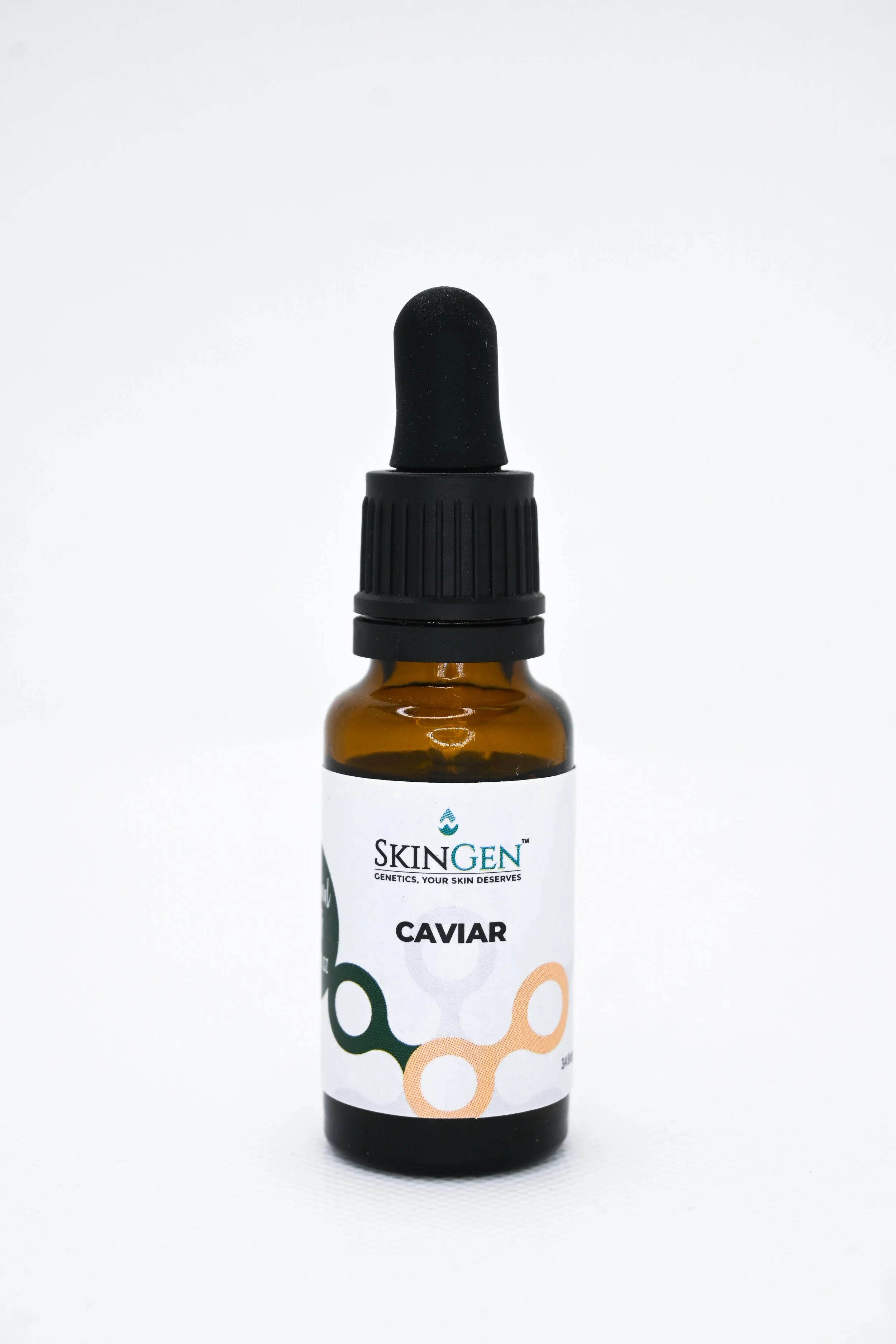 A small amber glass bottle with a black dropper cap, labeled 'SkinGen' and 'Caviar' on a white background.