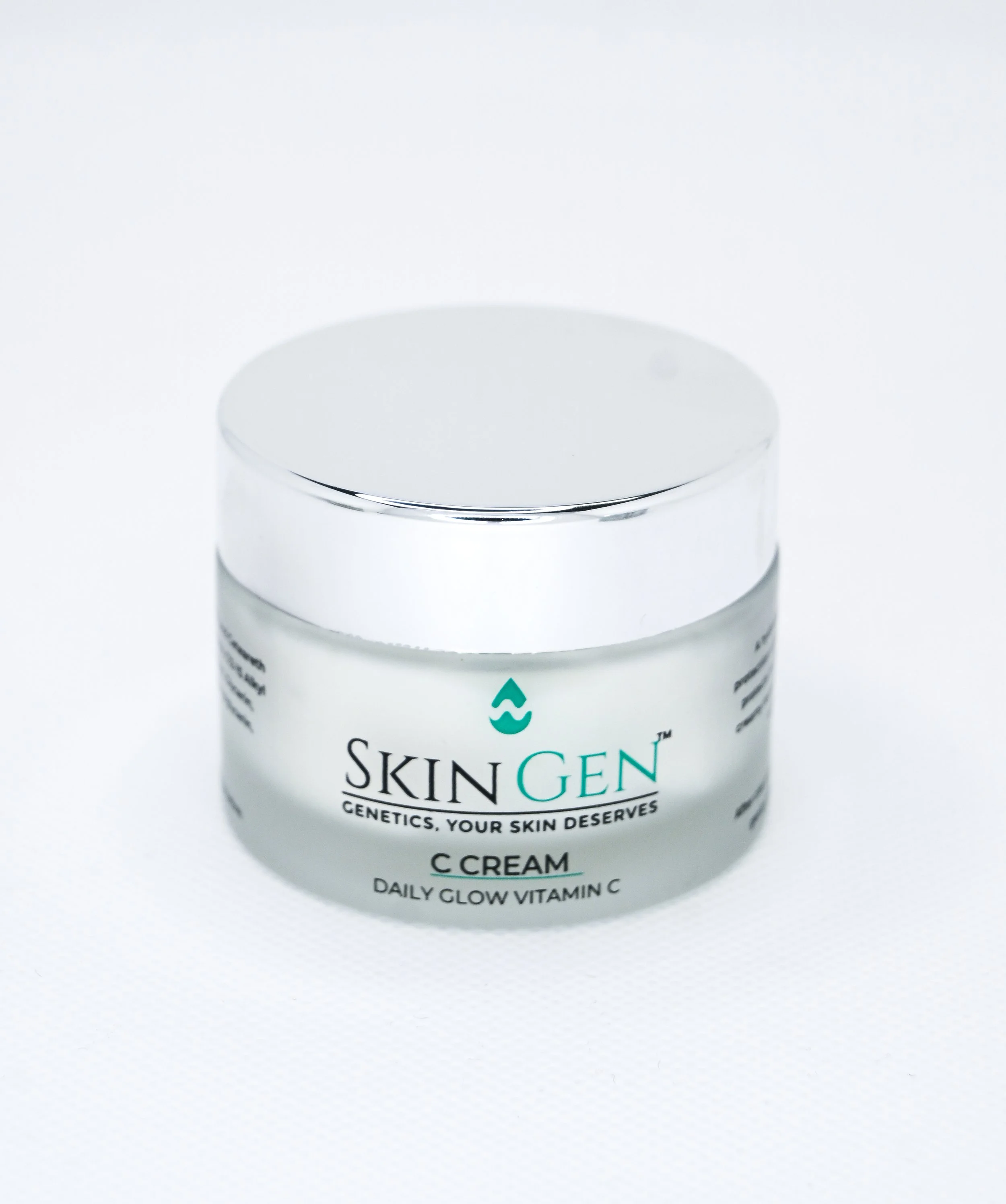 A jar of SkinGen C Cream with a silver lid on a white background.