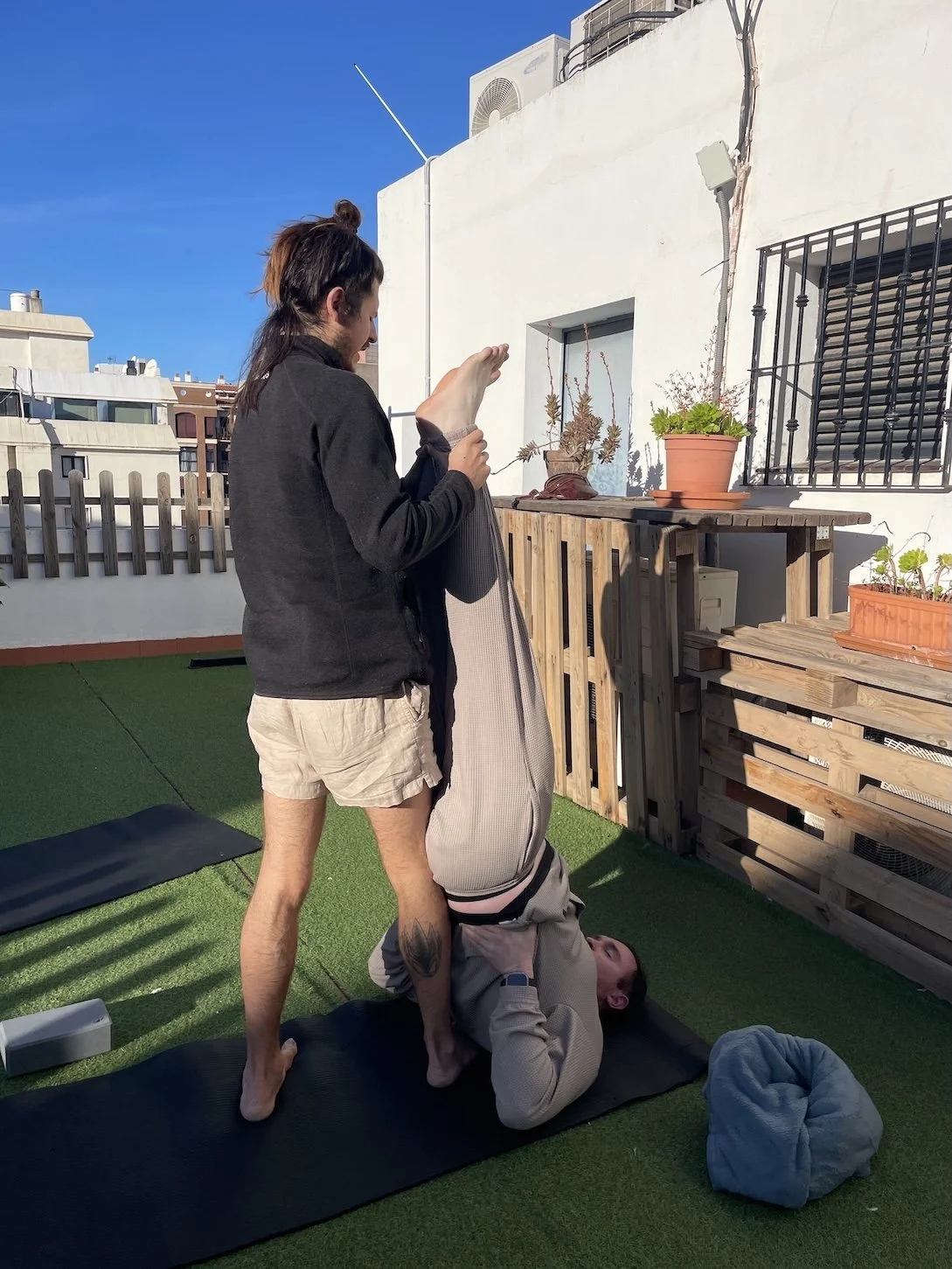 Assisted Yoga with Dan at TLR Coworking.JPG