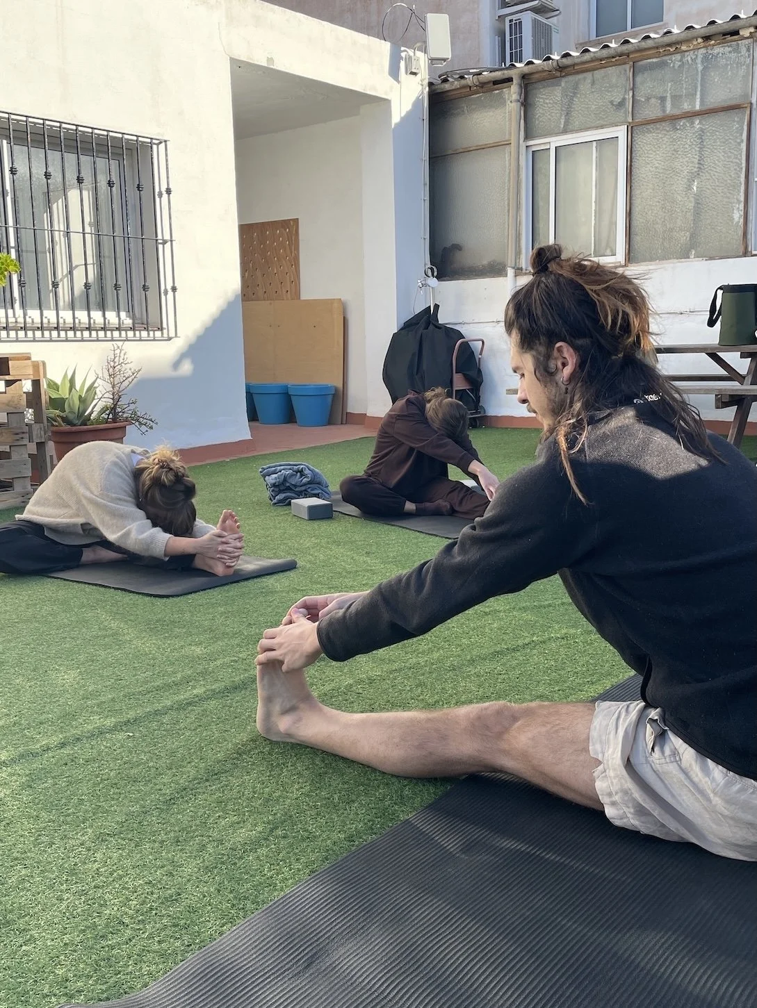 Deep stretching with Dan at TLR Coworking.JPG