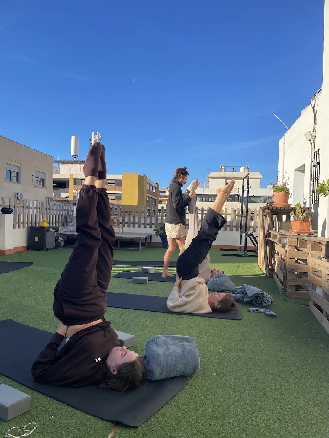 Shoulder Stand with Dan at TLR Coworking.JPG