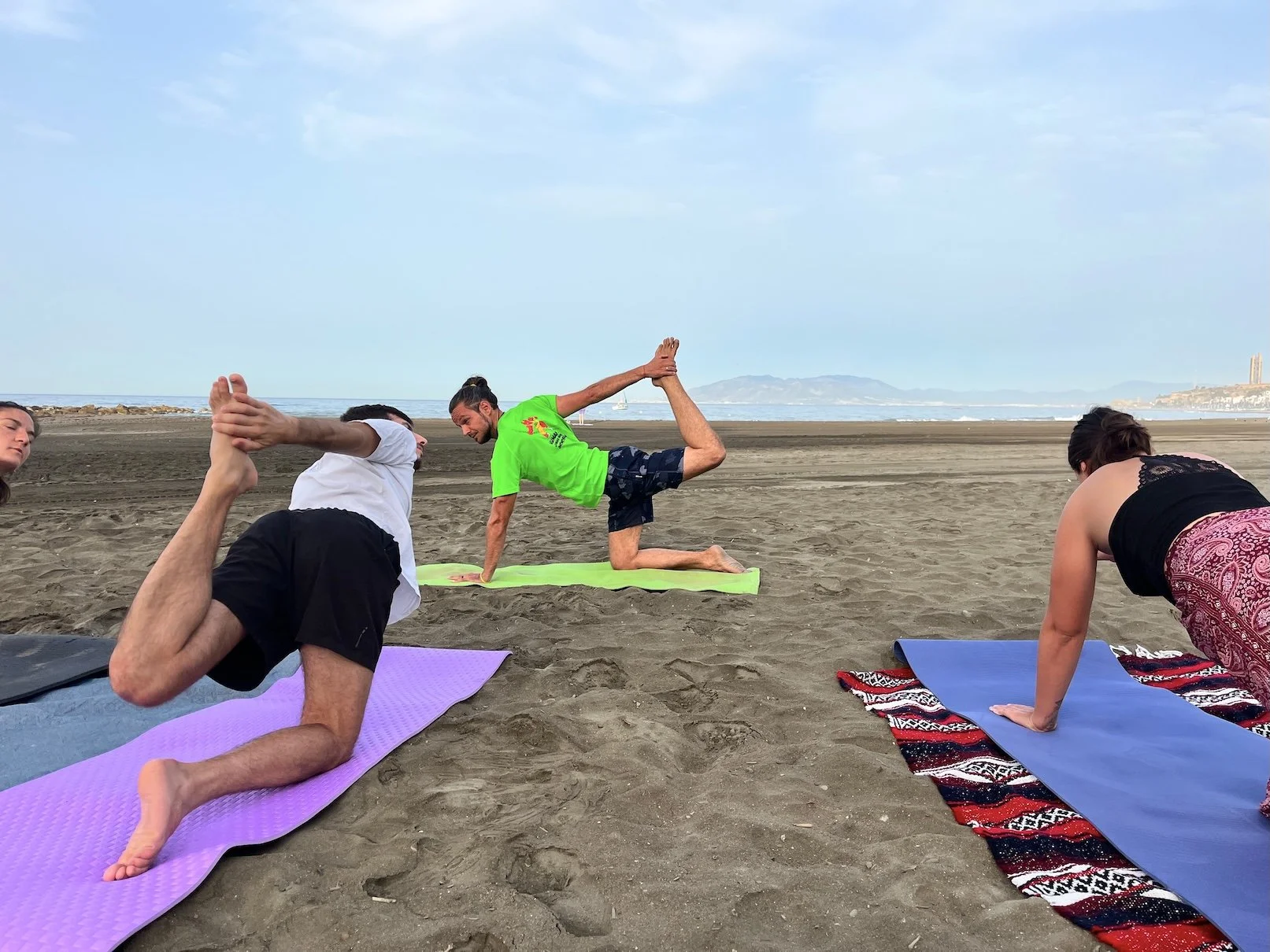 Warm up during beach yoga.jpg