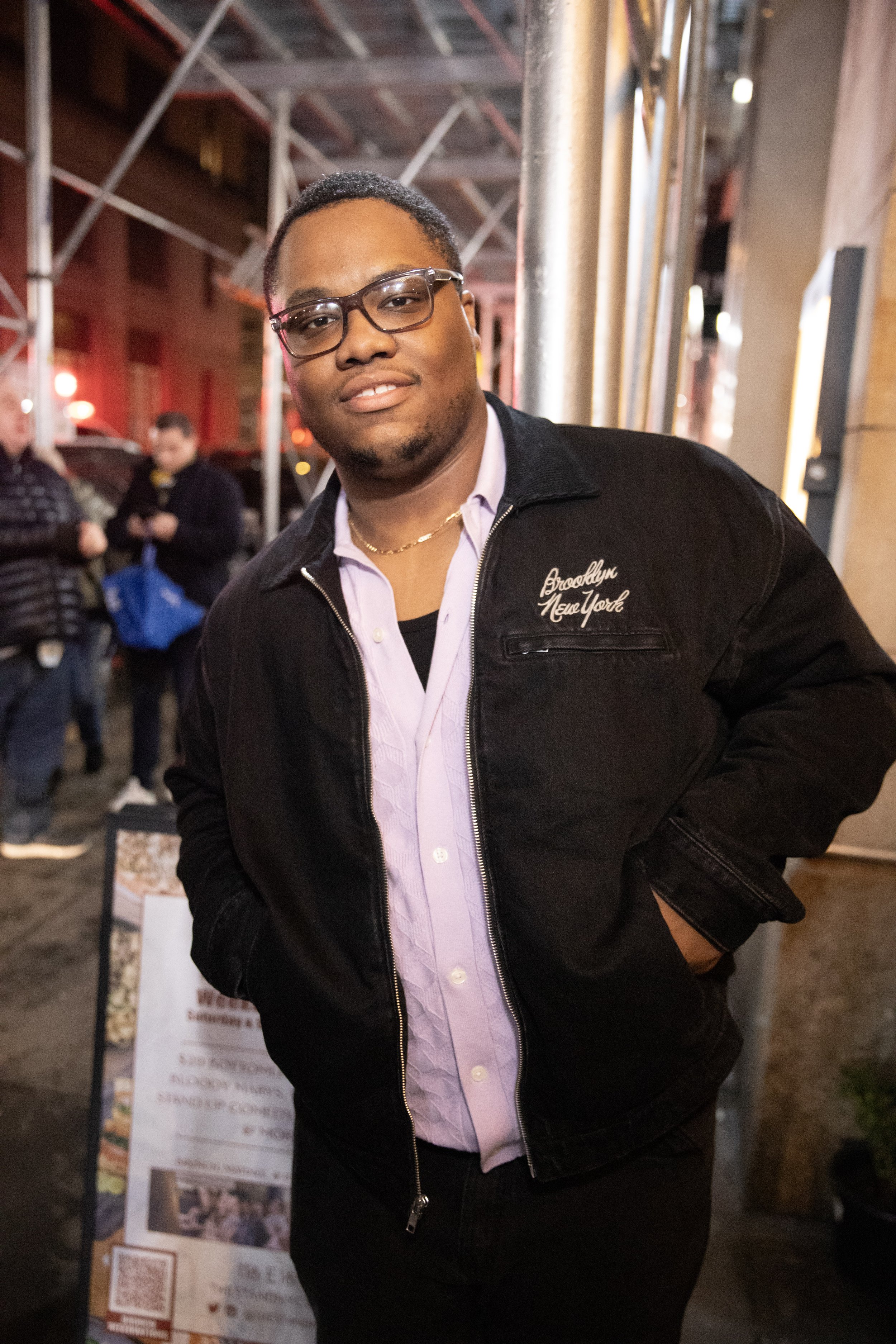 Khris Black posing outside of The Stand. Photo by JT Anderson.