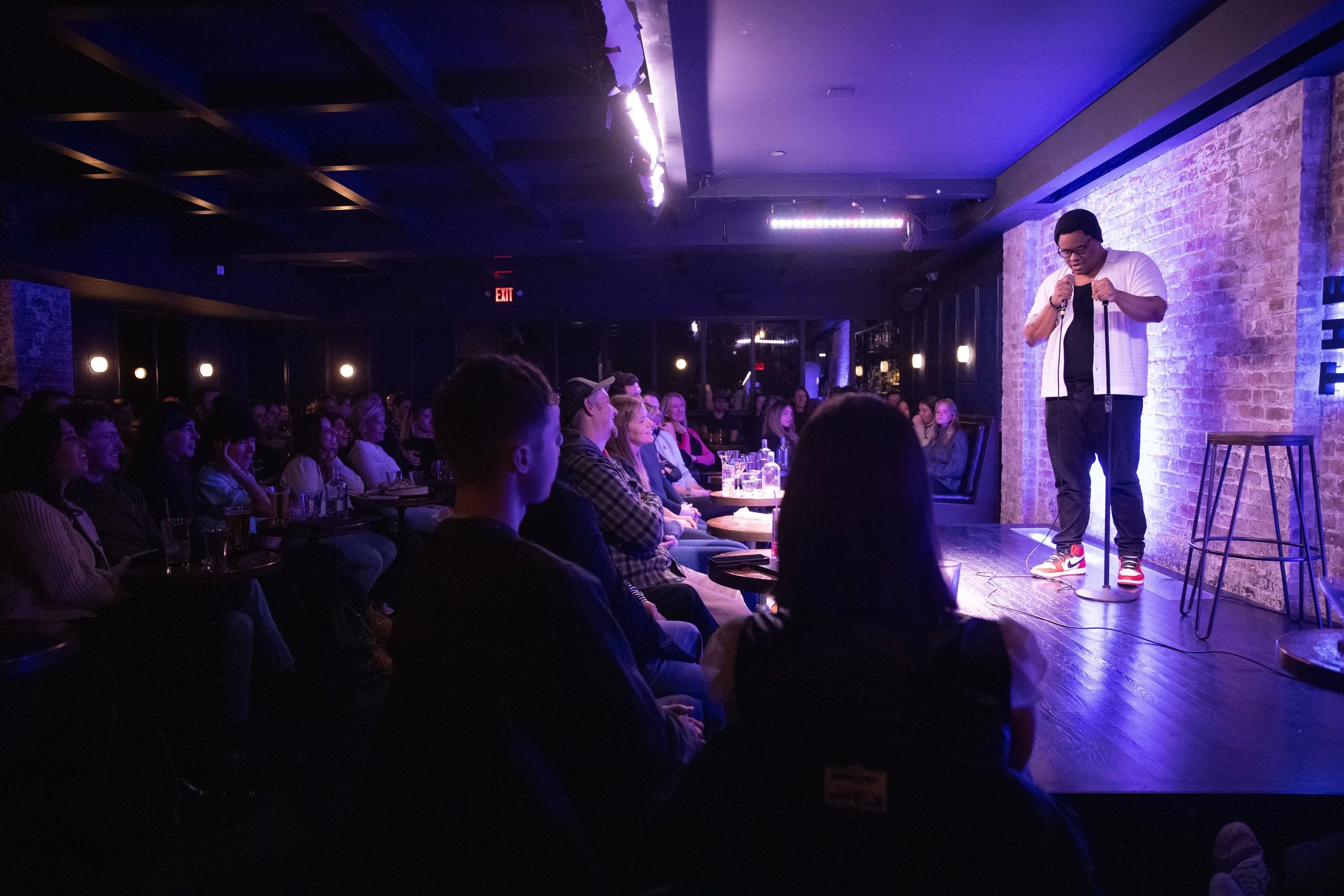 Khris Black performing at The Stand NYC. Photo by JT Anderson.