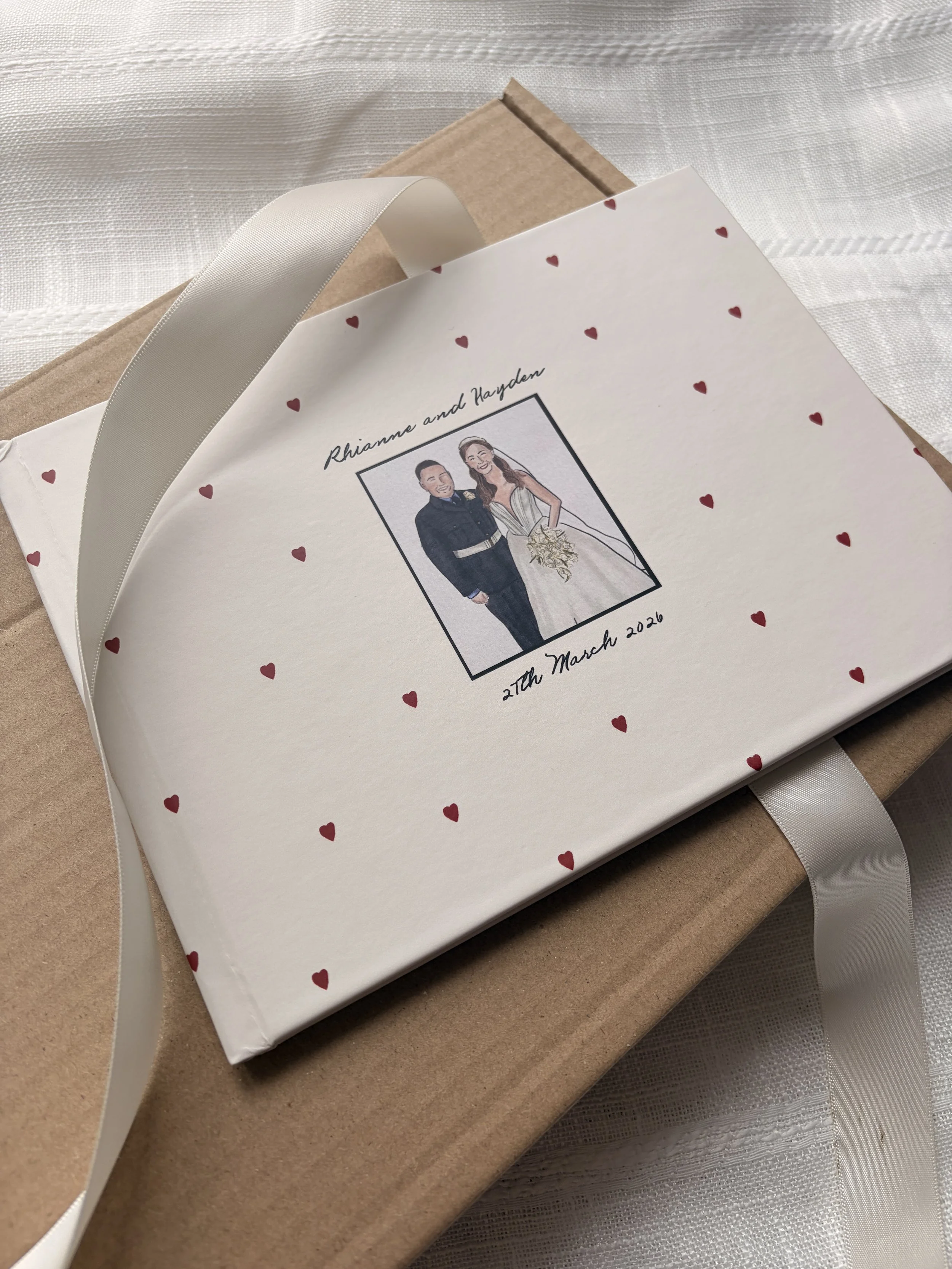A Mini Hardbook printed book, full of all of R&L's live illustrations from their wedding day - the perfect keepsake for their coffee table. 