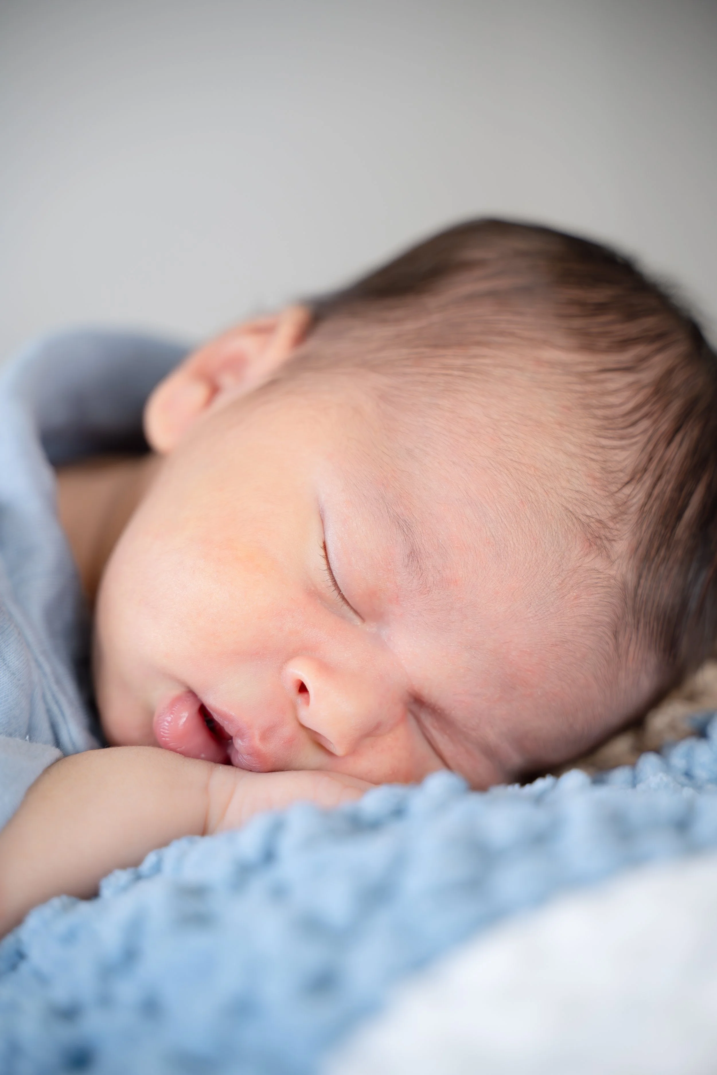 houston the heights newborn baby at home during photo session sleeping with eyes closed