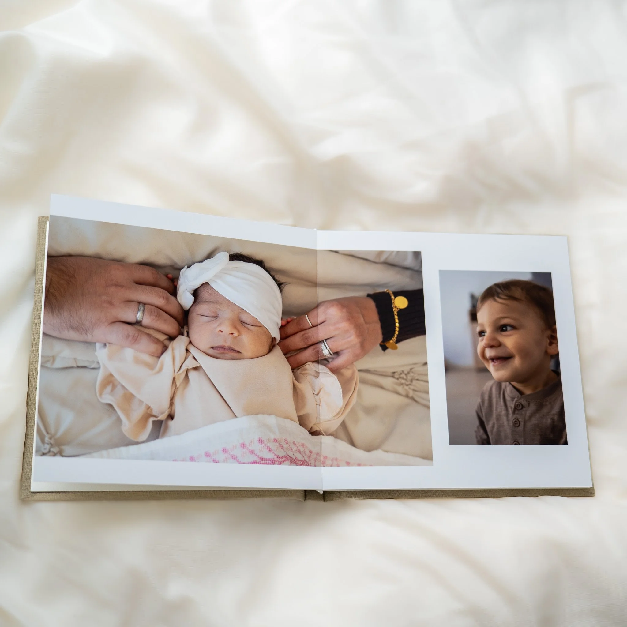 luxury photo album of houston in-home newborn photographer