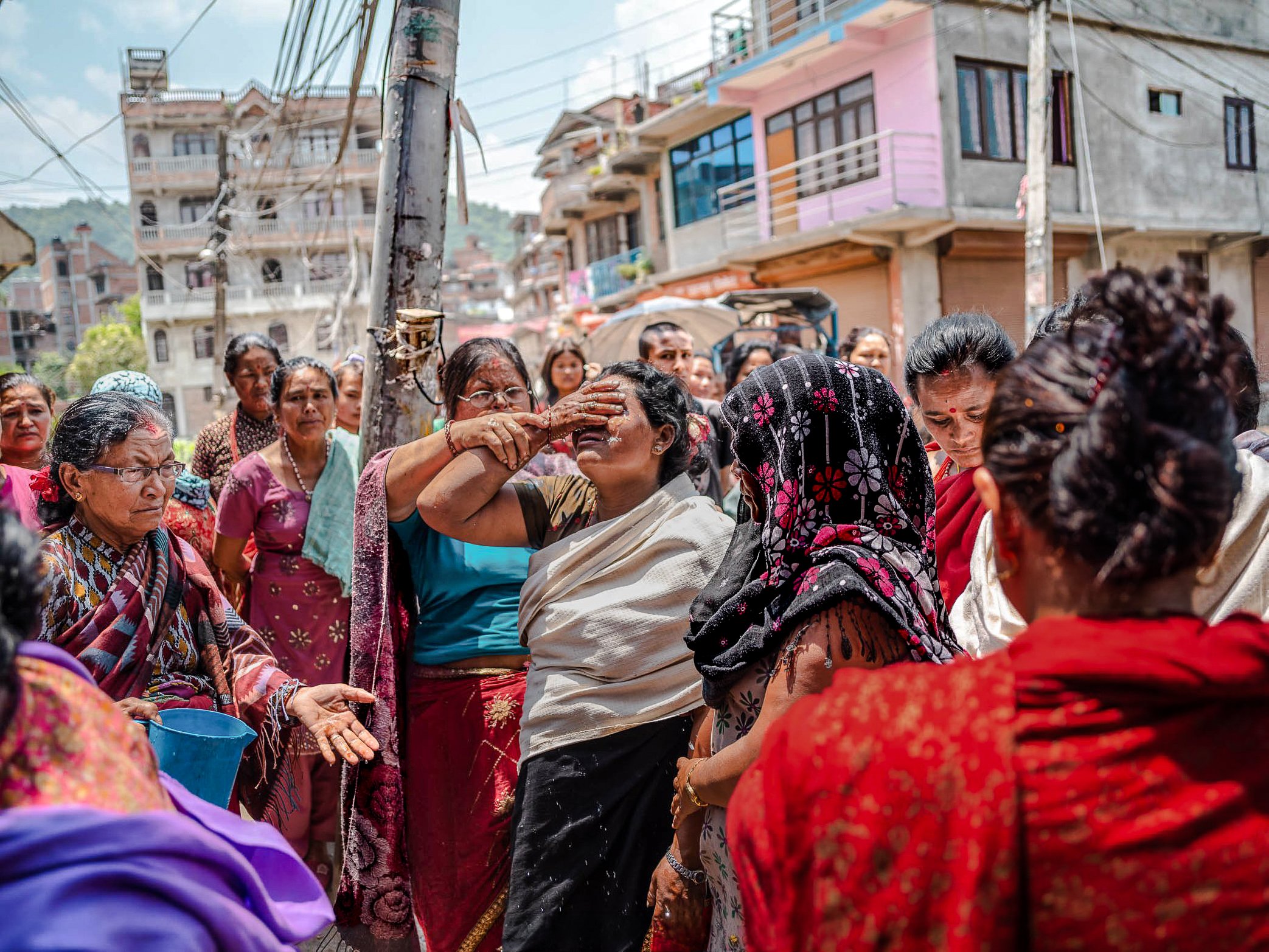 Grief breaks into the street in Kathmandu after the earthquake. In the days and weeks that followed, sorrow was visible almost everywhere - outside damaged homes, beside temporary shelters, and along roads where families searched for news of relative