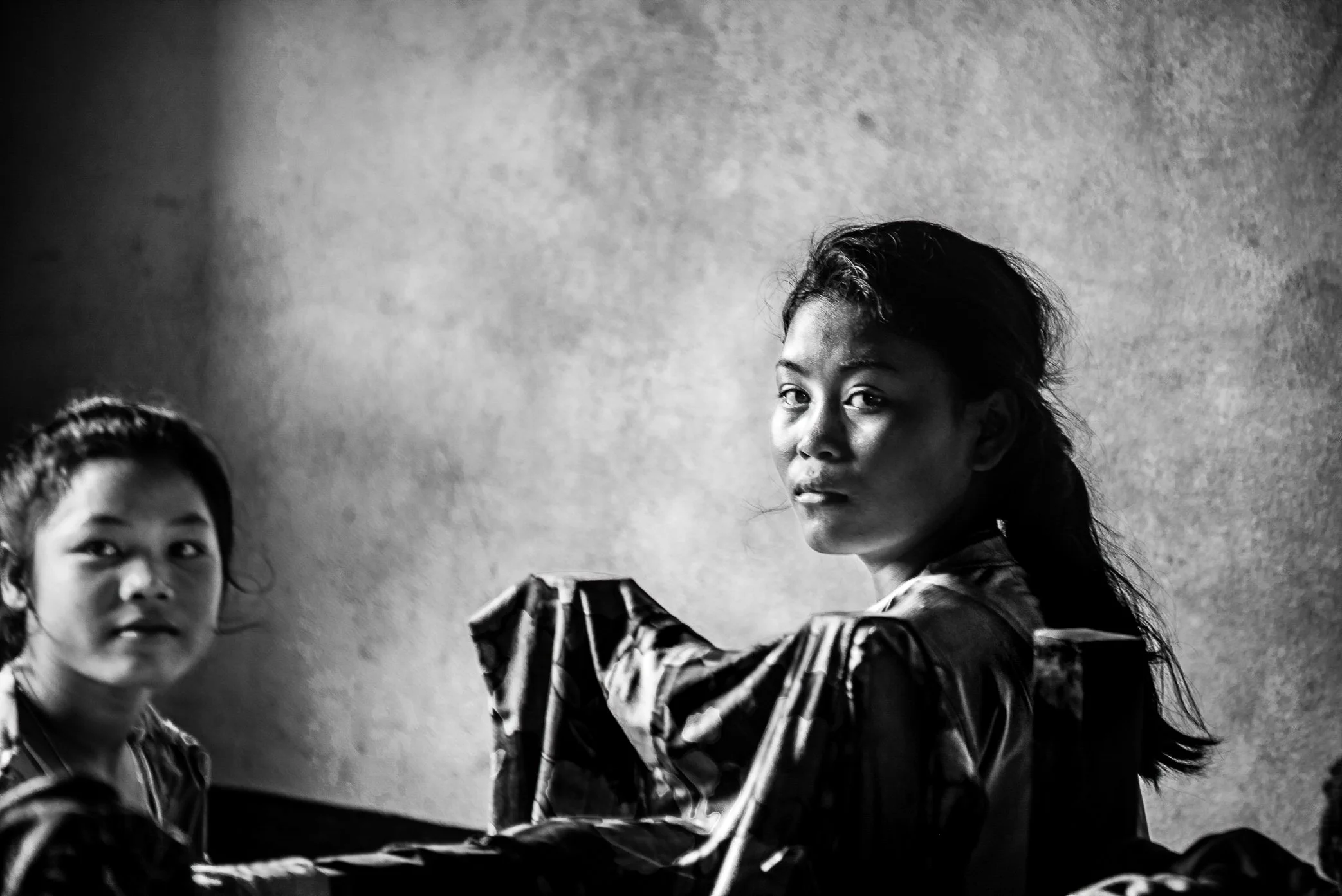 Hin Lat Village, Attapeu, Laos - Nearly a week after the Xe Pian dam collapse, survivors from Hin Lat remained in shock and grief. Inside the shelter, the weight of the disaster was still visible in their faces - the loss of homes, relatives, belongi
