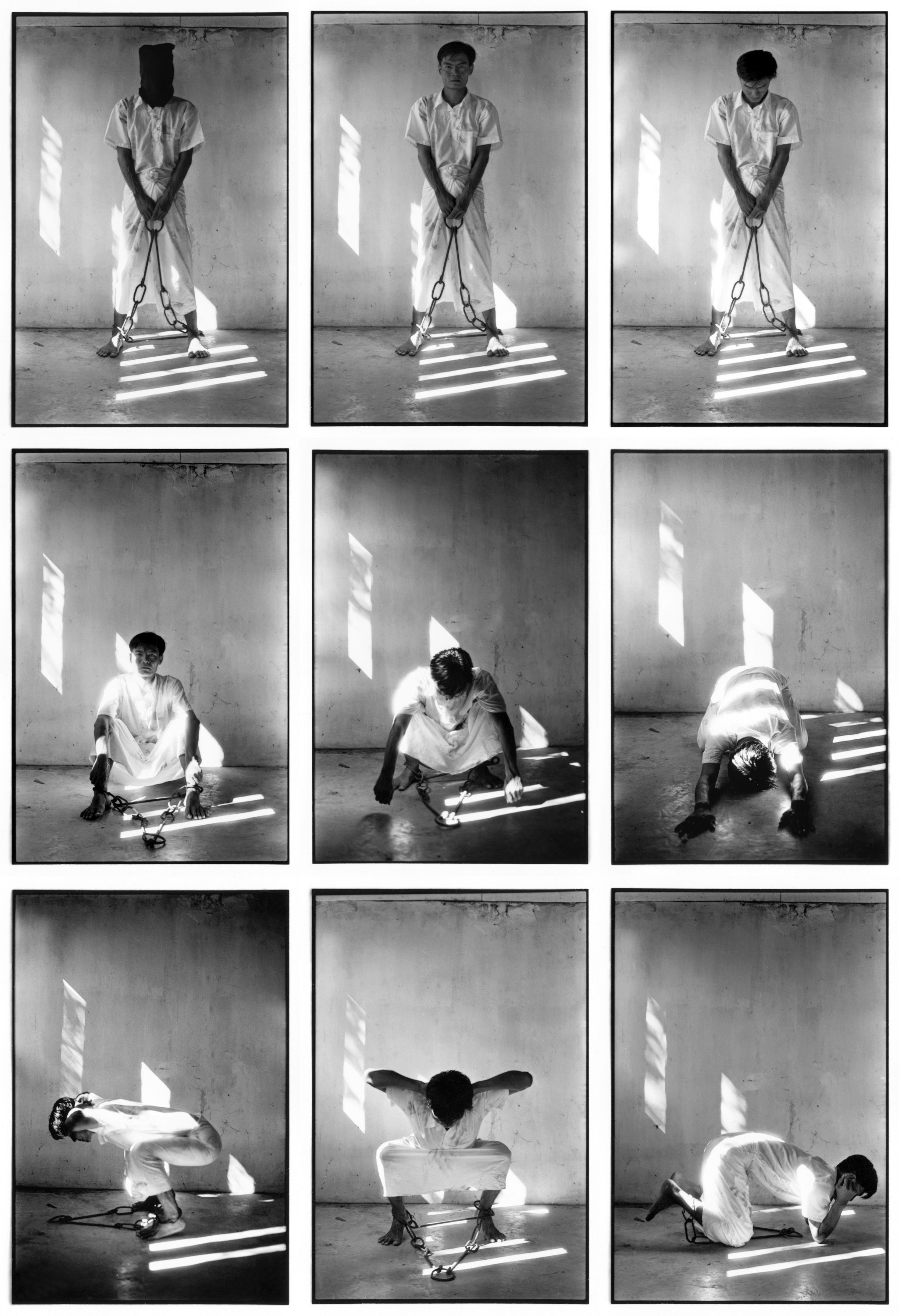 Nine black-and-white photos arranged in a 3x3 grid showing a person in a white outfit demonstrating various yoga or stretching poses against a plain wall with light and shadow patterns.