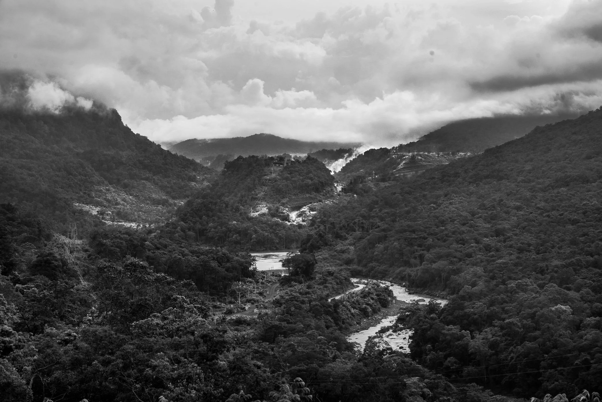 Attapeu, Laos - After the Xe Pian dam collapse, floodwater surged through the Xe River valley, tearing through bridges and crossings on its way downstream. Before reaching Tha Hin Lat - the first village hit by the disaster - the river had already be