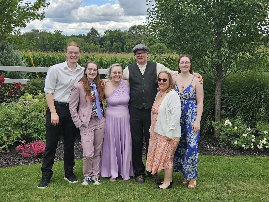 Jenn Currie deFouw with family and friends, author life and personal story behind her romance books