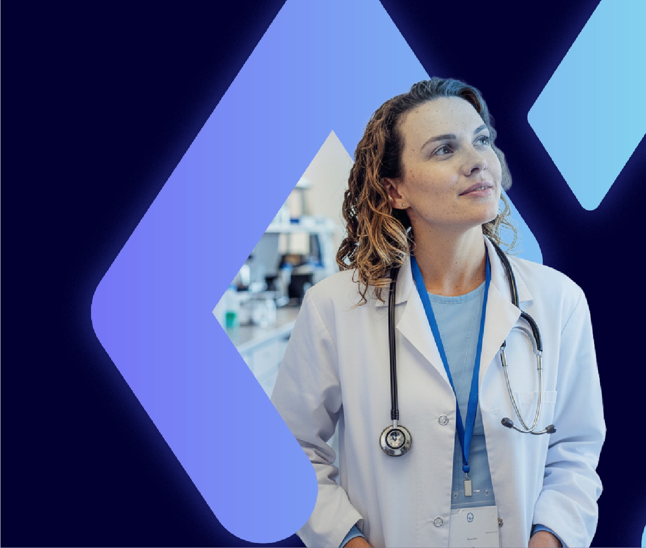 Female doctor with a stethoscope around her neck, wearing a white coat and a blue badge, standing in a medical clinic or hospital.