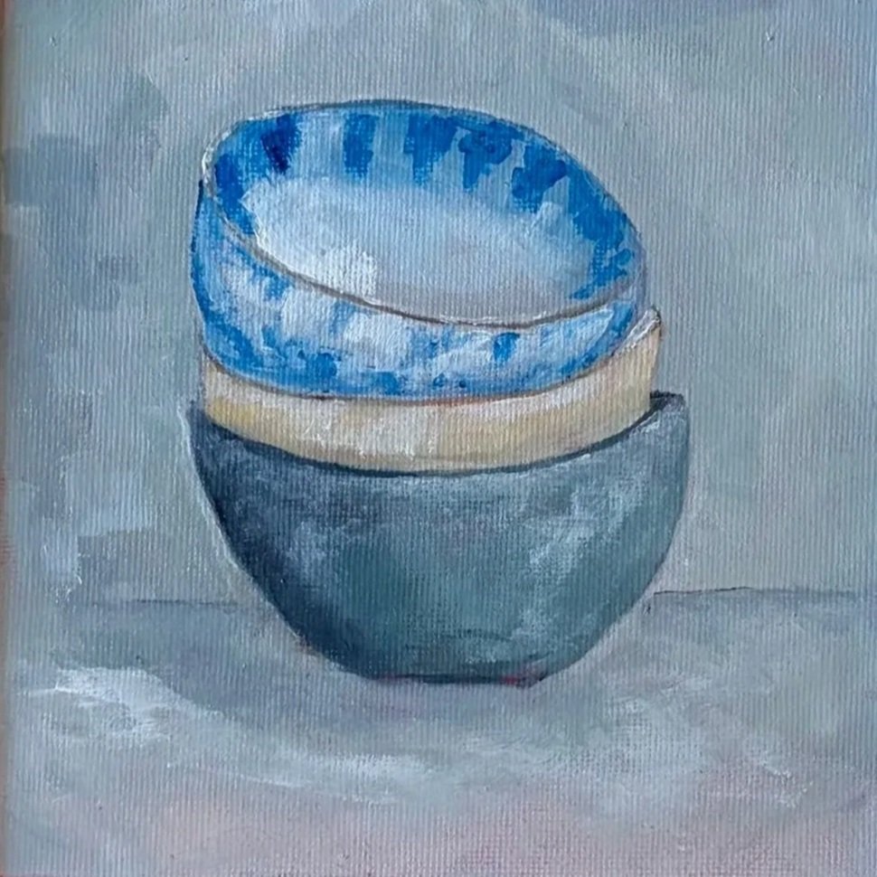 Detail of original oil painting of stacked bowls on canvas in natural wood frame.