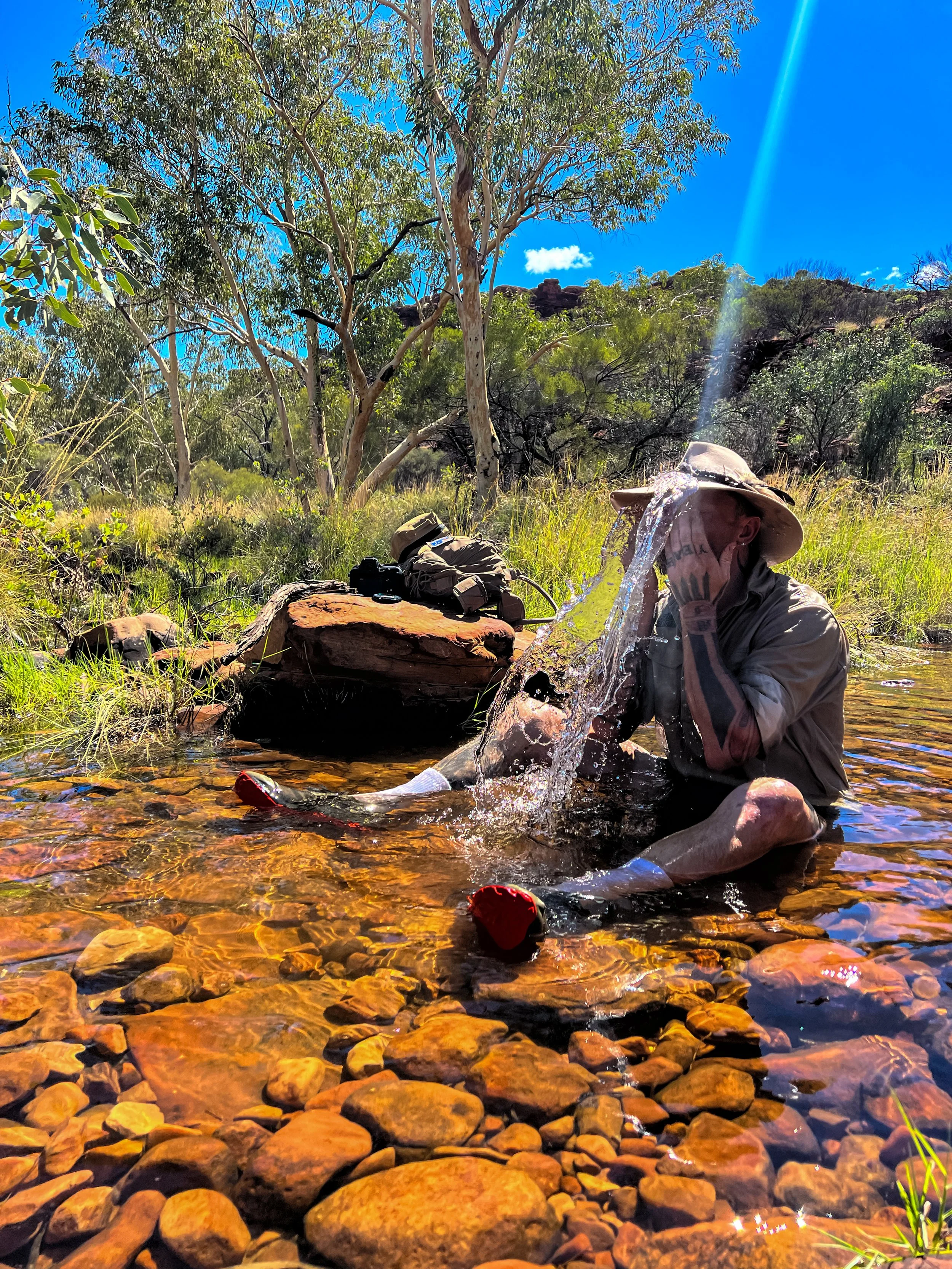 Wildman bathing in Todd River