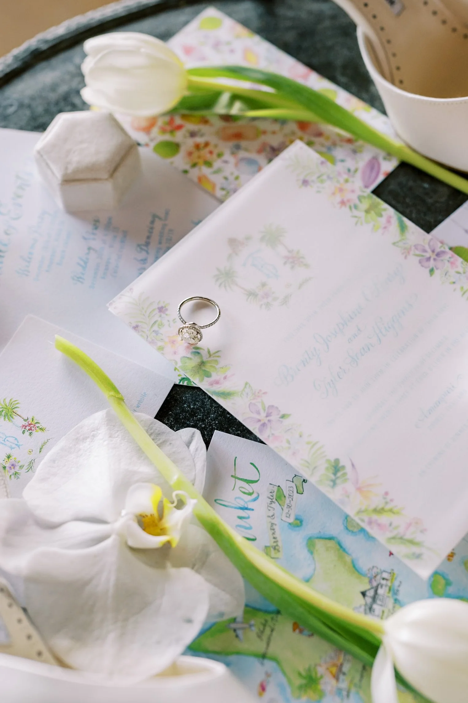 Wedding stationery and ring detail for a destination wedding at Amanpuri in Phuket, Thailand