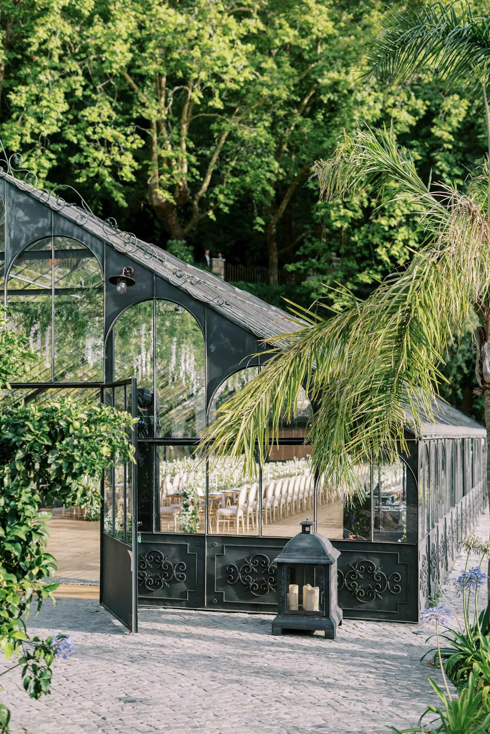 The Glass House surrounded by Sintra greenery at Quinta da Bella Vista in Portugal