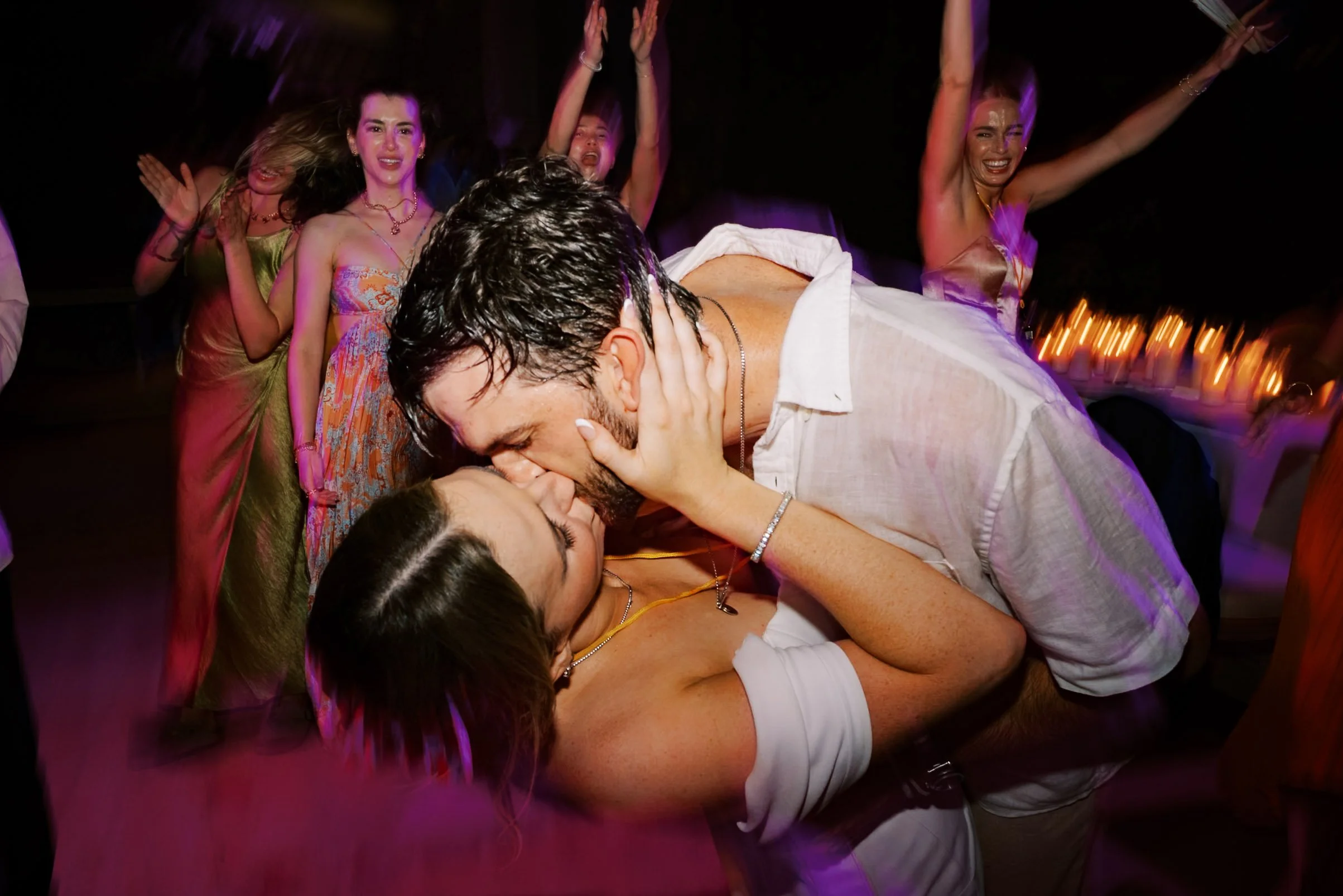 Bride and groom kissing on the dance floor at Amanpuri in Phuket, Thailand