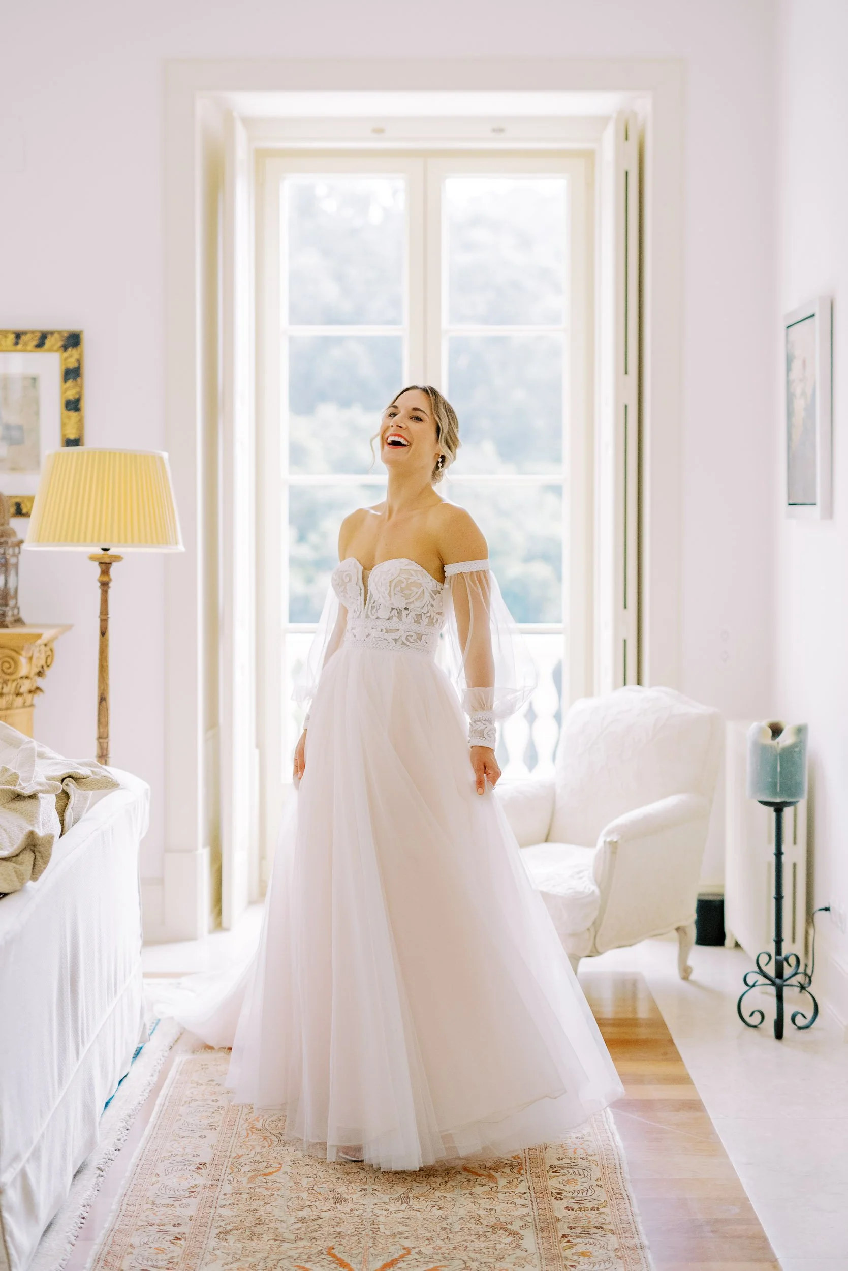 Bride standing indoors in natural light at Quinta da Bella Vista in Sintra, Portugal