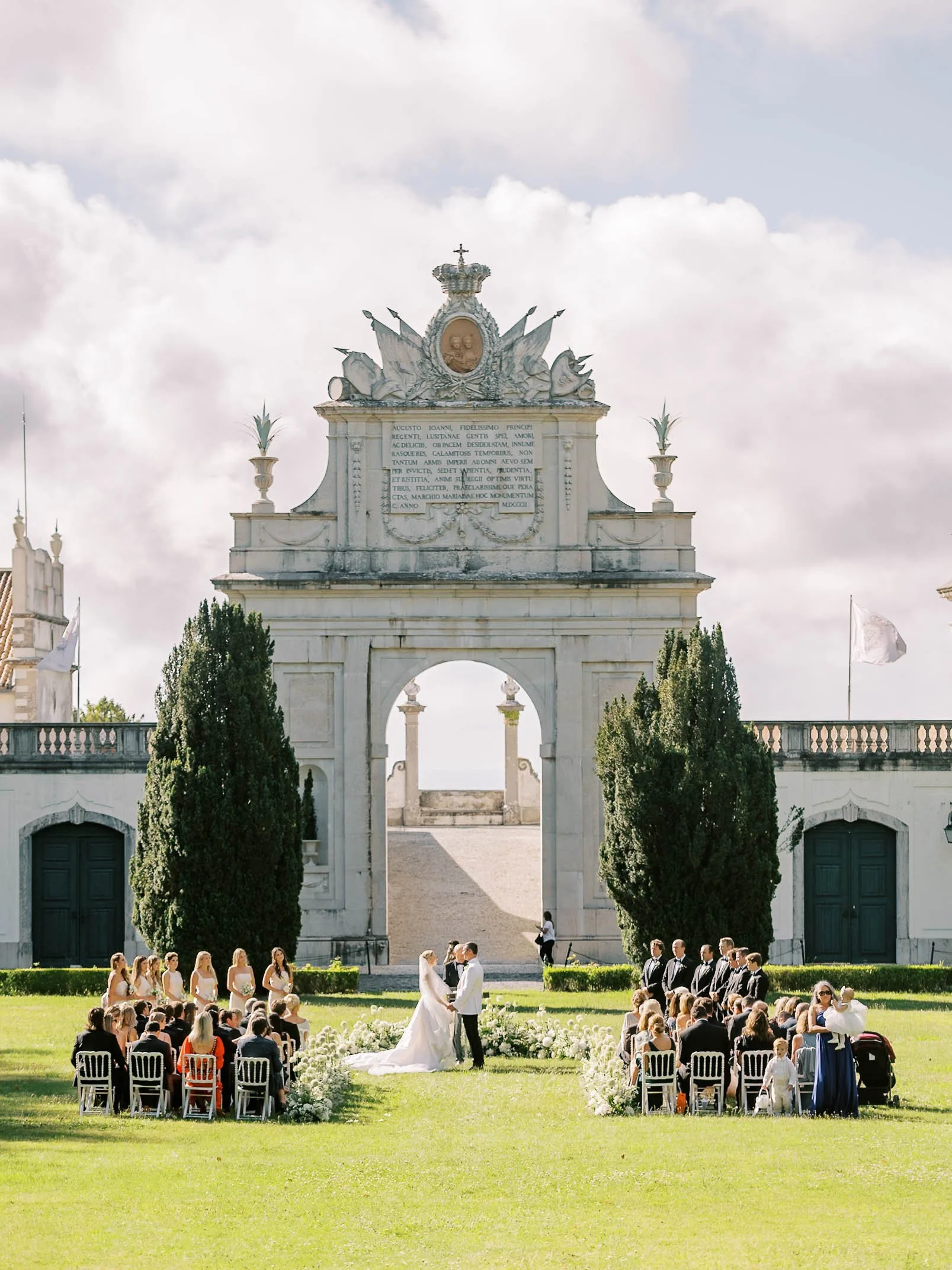Wedding ceremony in front of the arch at Palácio de Seteais Sintra