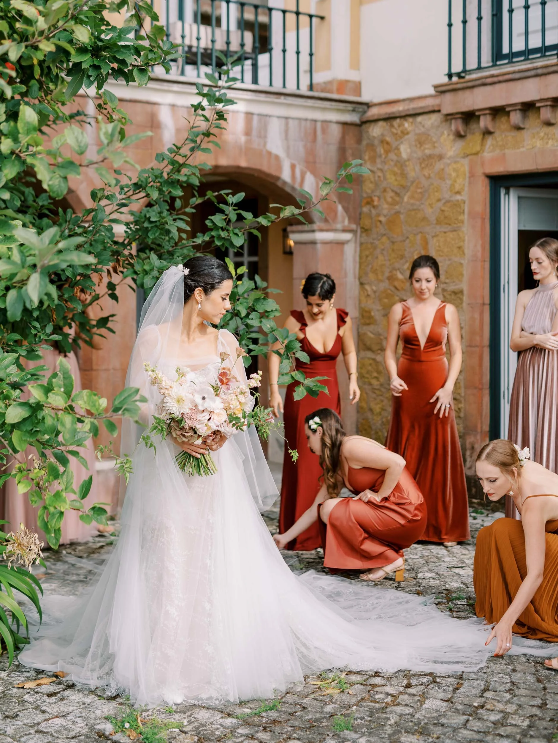 Bride getting ready with bridesmaids at Quinta da Bella Vista in Sintra