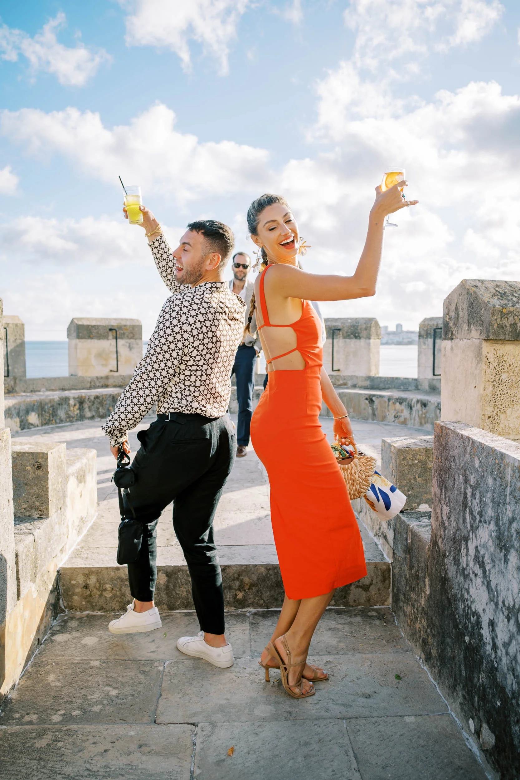 Guests celebrating on the terrace at Forte da Cruz in Estoril, Portugal