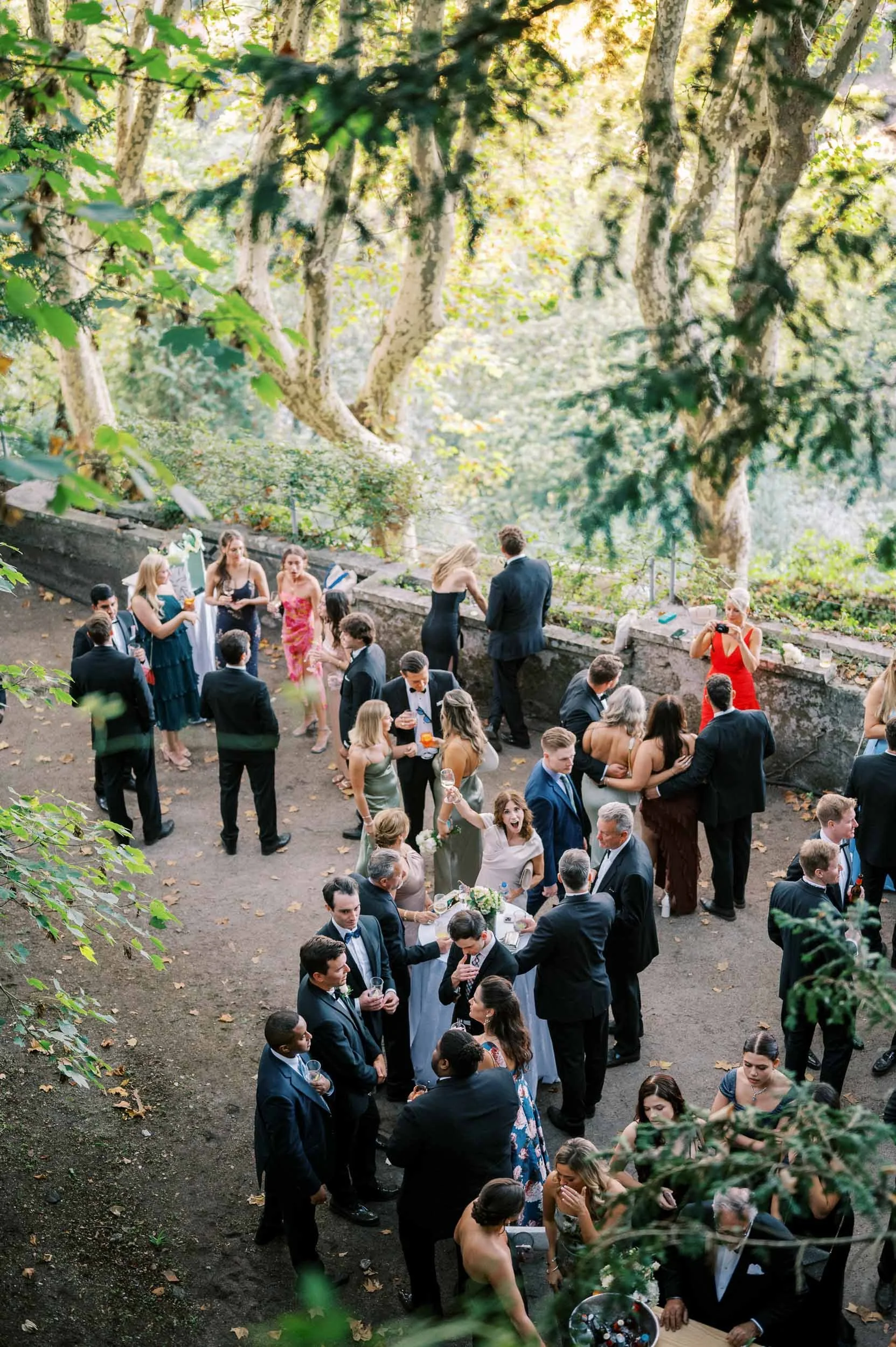 Wedding guests during cocktail hour at Casa dos Penedos in Sintra