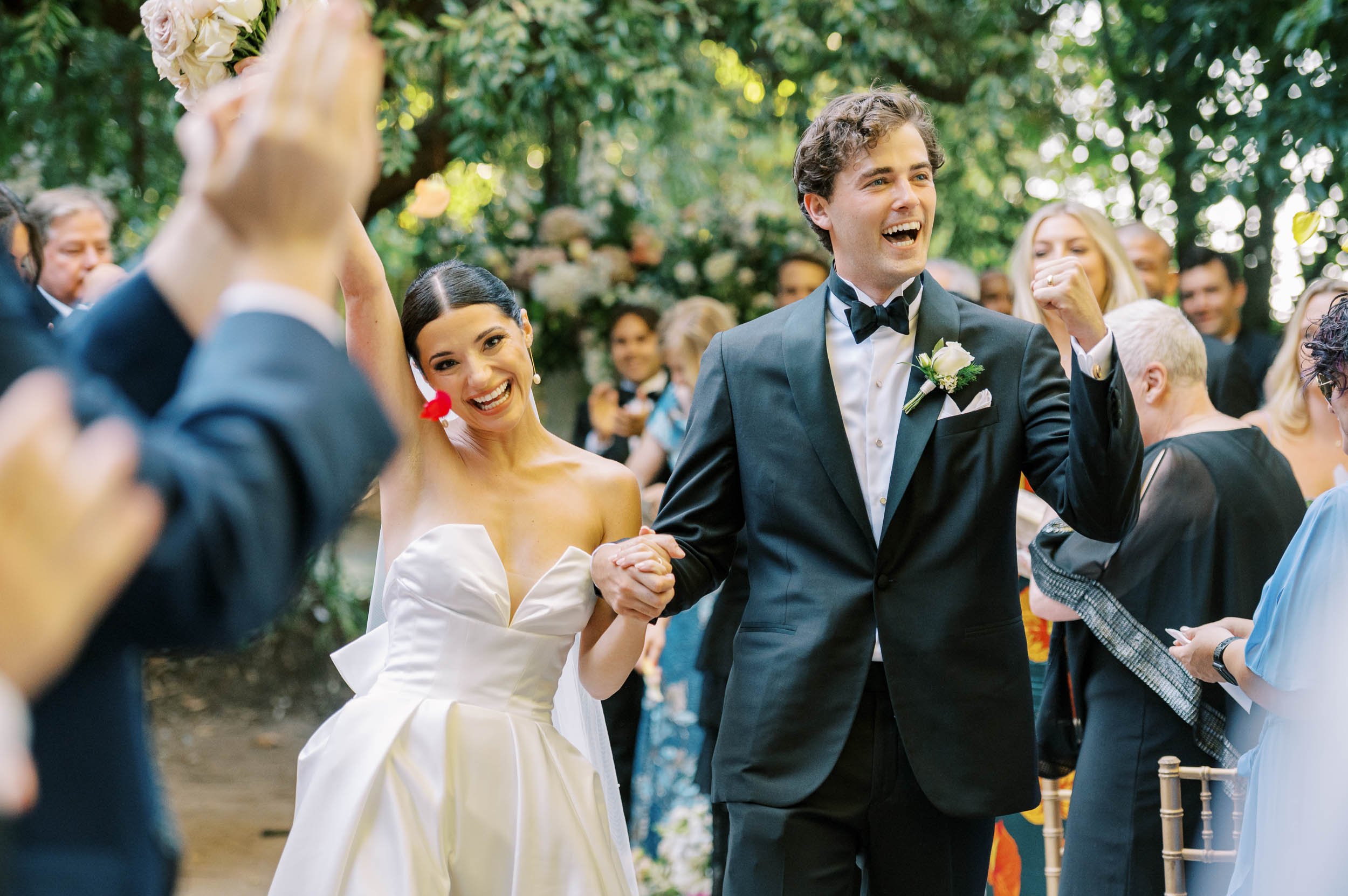 Bride and groom leaving the ceremony at Casa dos Penedos in Sintra
