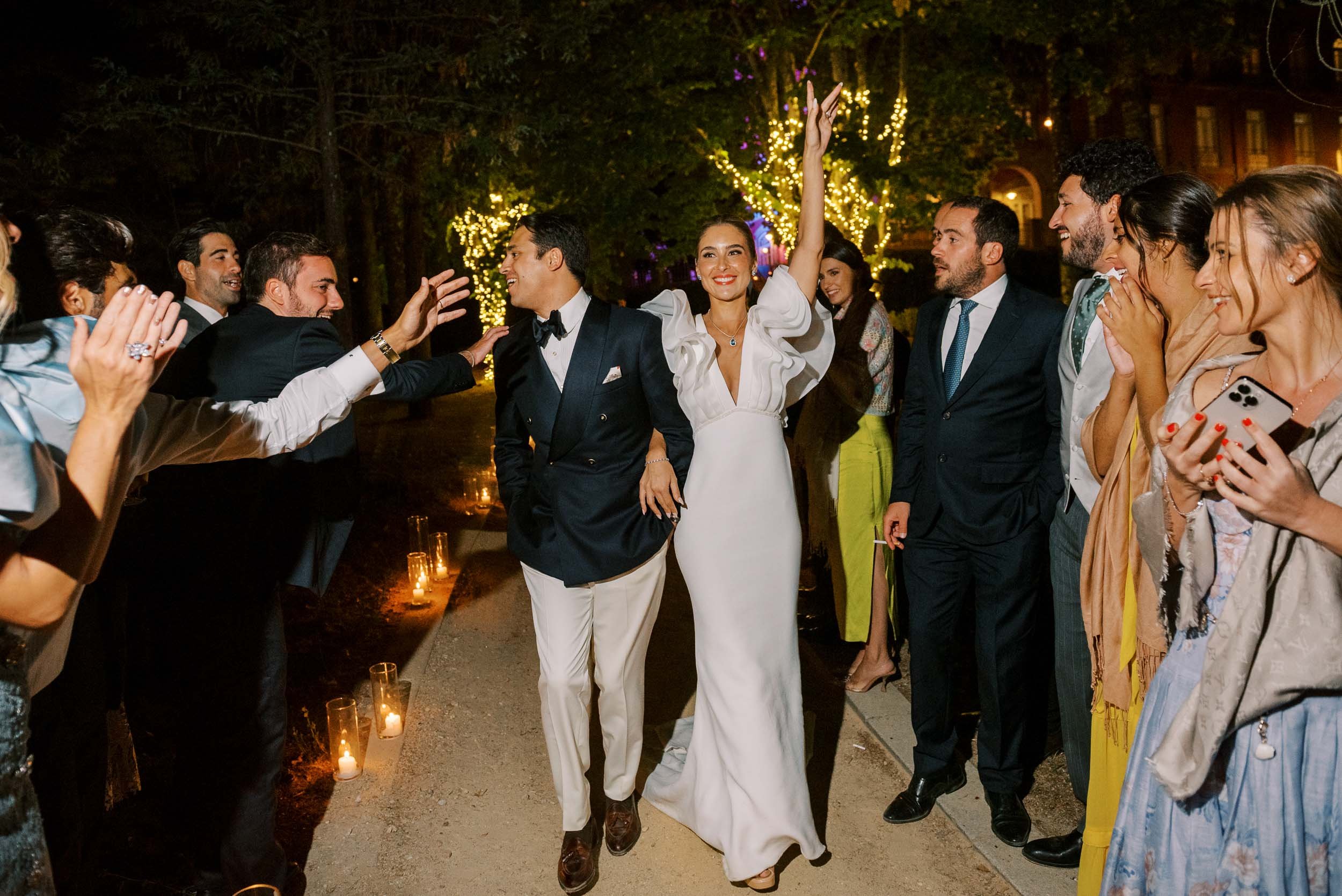 Bride and groom arriving at the party during a wedding at Vidago Palace Hotel in Portugal