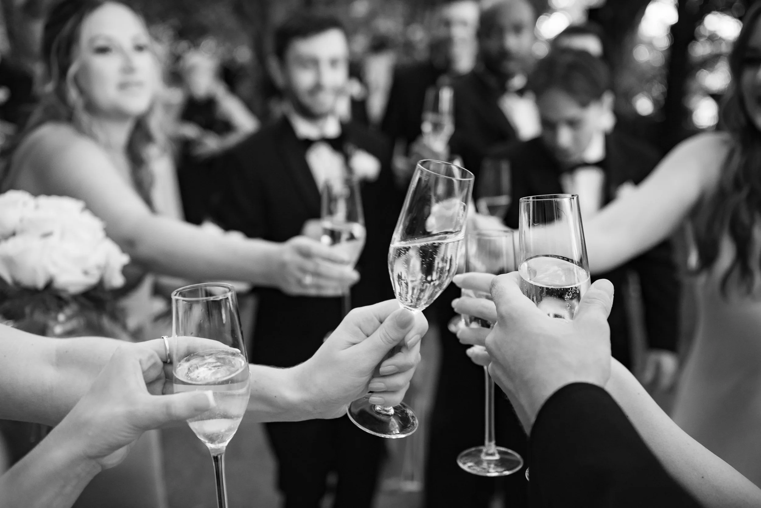 Wedding guests toasting during cocktail hour at Casa dos Penedos in Sintra