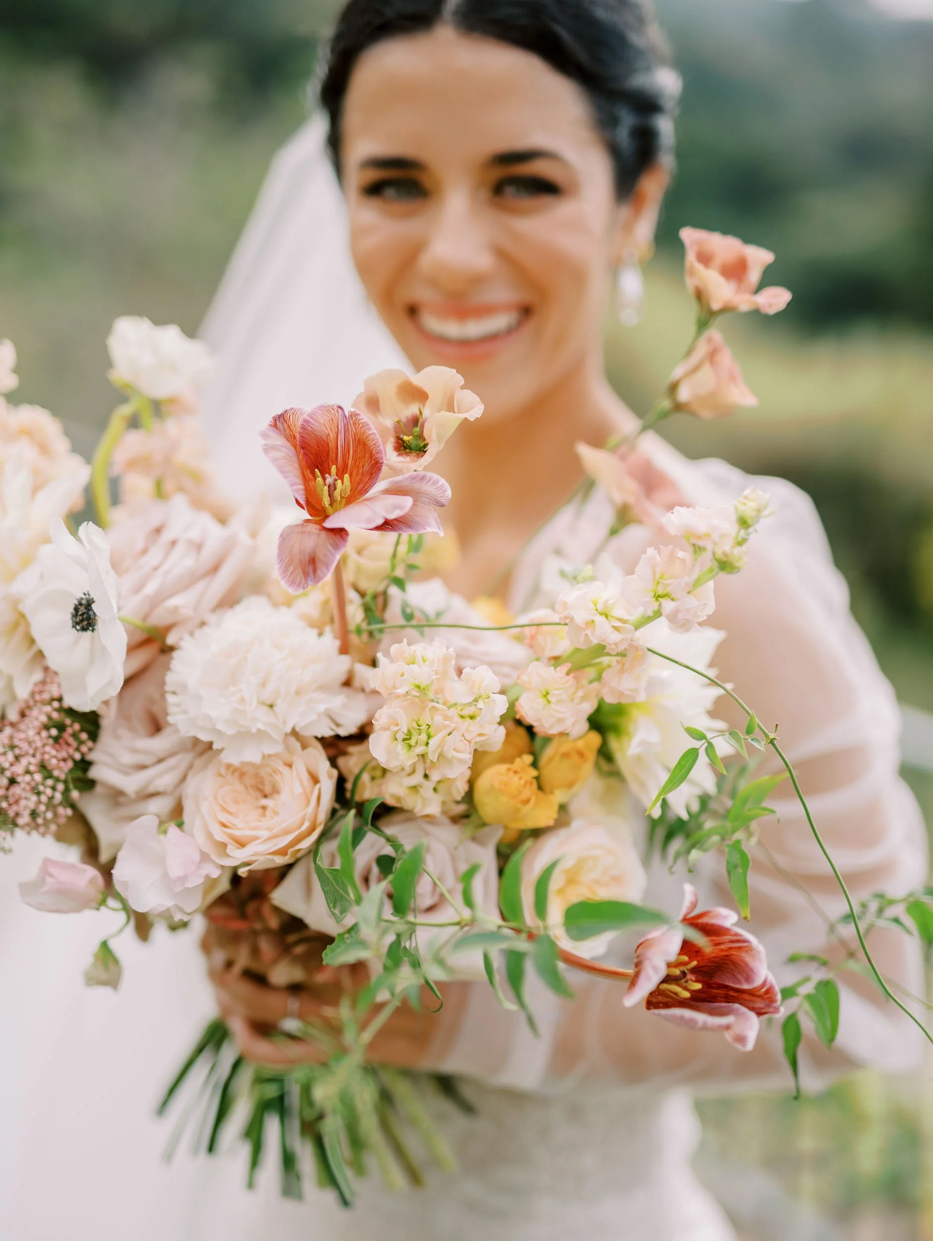 Bride with bouquet at Quinta da Bella Vista in Sintra