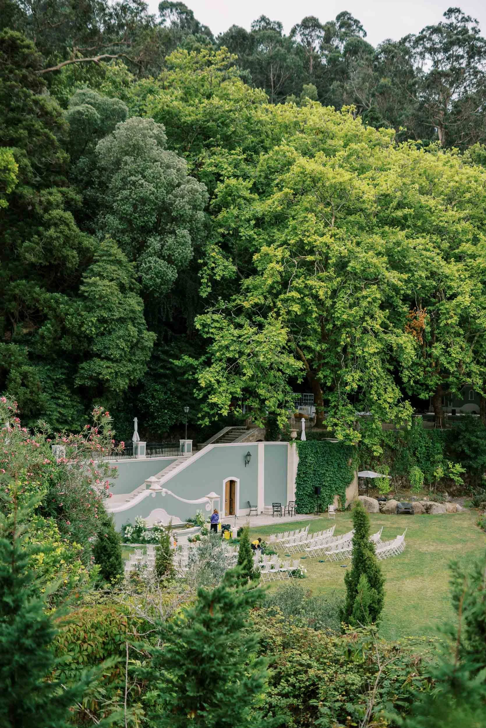 Ceremony space surrounded by greenery at Quinta da Bella Vista in Sintra, Portugal