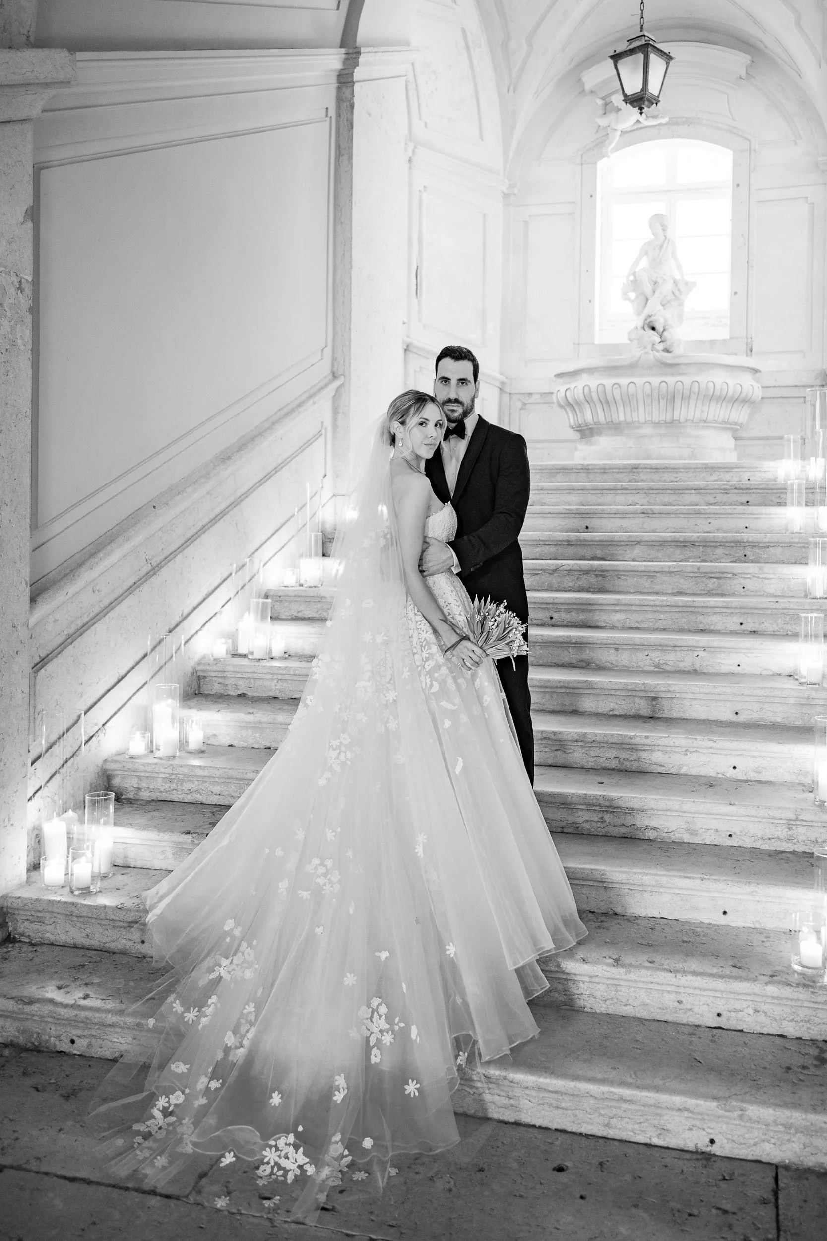 Bride and groom portrait on the staircase at Palácio do Correio-Mor in Portugal