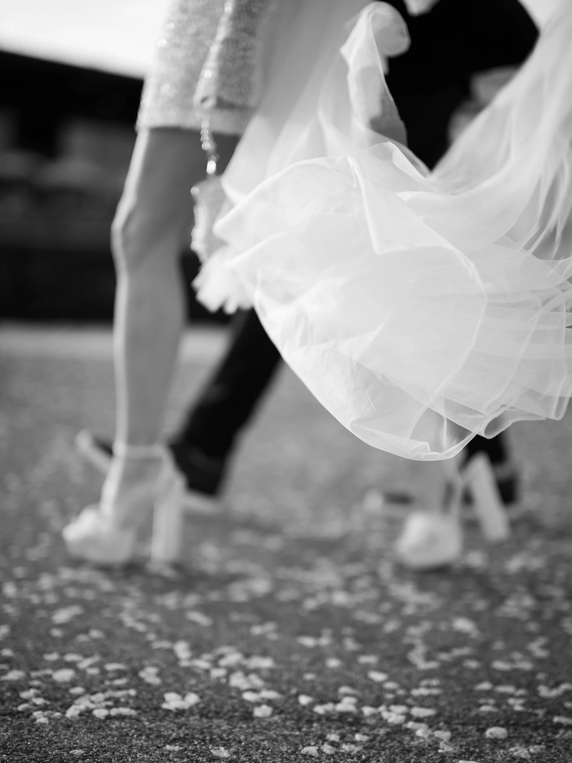 Close-up of Bride and Groom feet walking on a photo session in Lisbon.