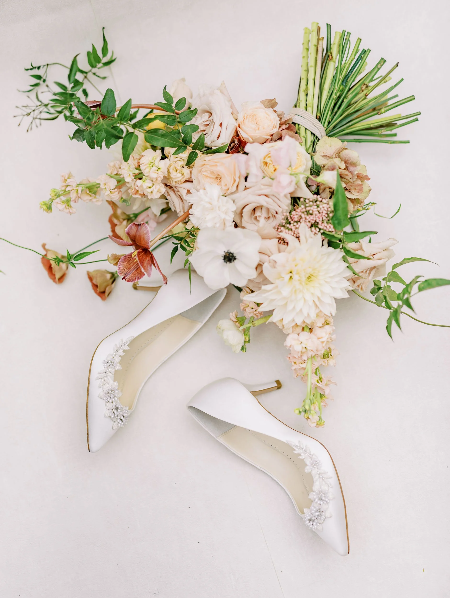 Bridal bouquet and shoes details at Quinta da Bella Vista in Sintra