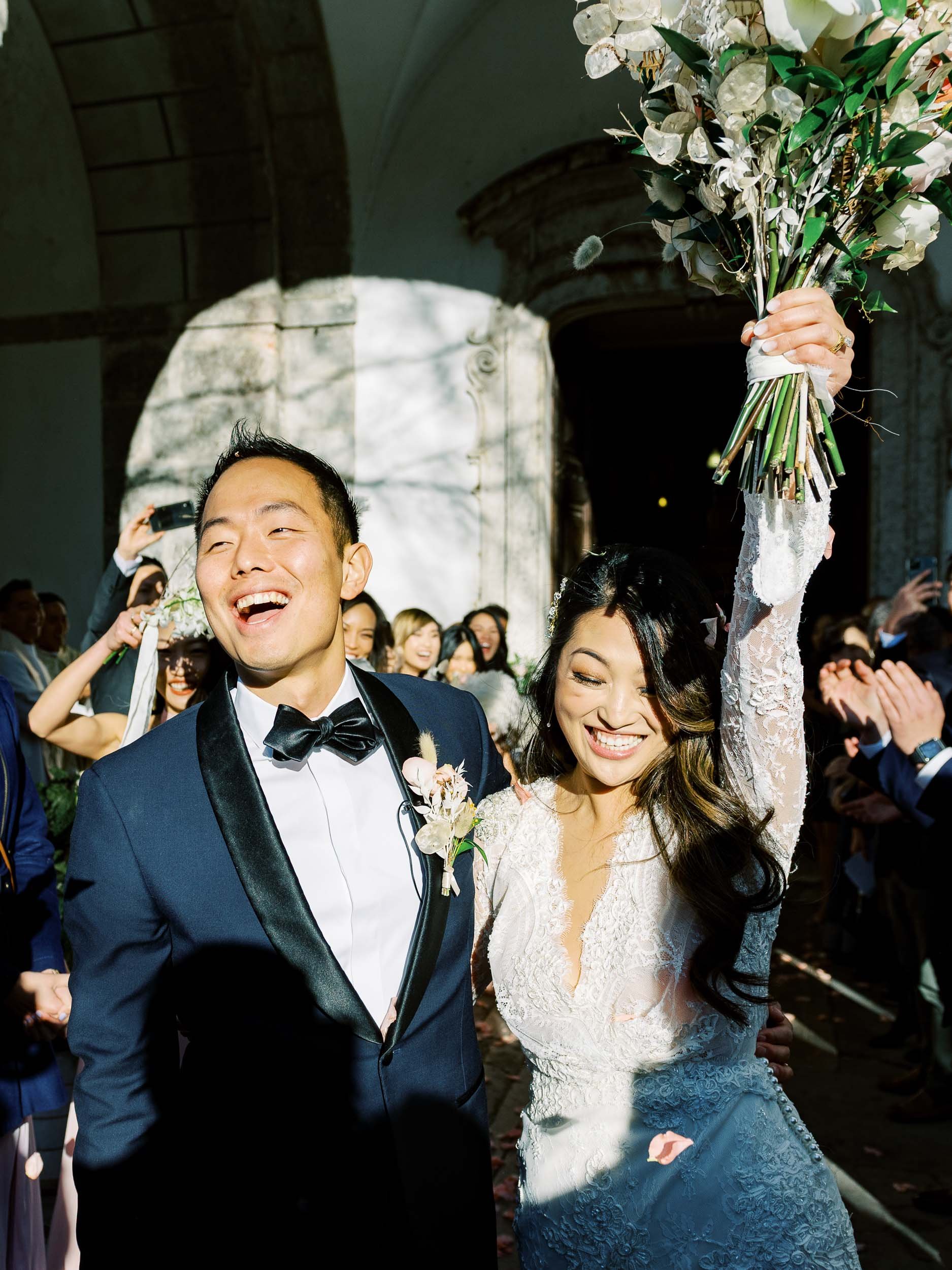 Bride and groom celebrating after the ceremony in Sintra, Portugal