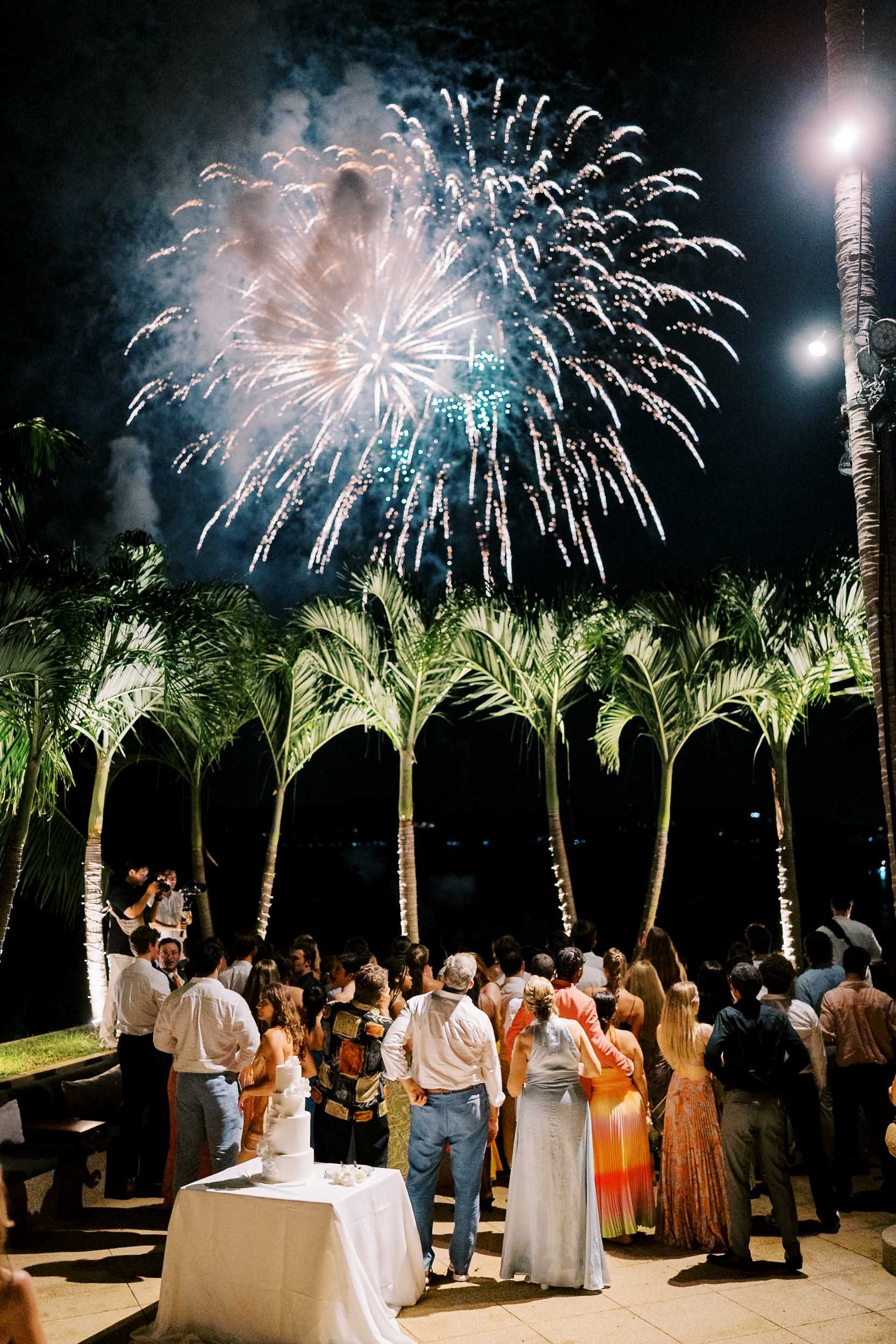 Guests watching fireworks during the wedding celebration at Amanpuri in Phuket, Thailand