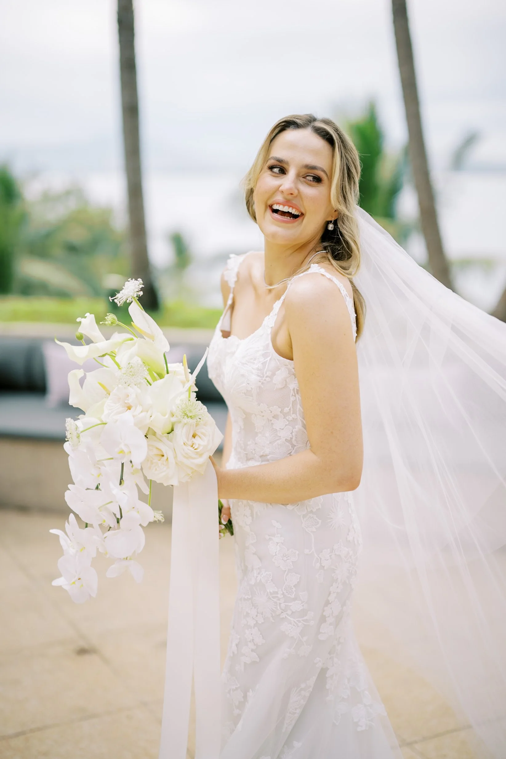 Bride portrait with bouquet at Amanpuri in Phuket, Thailand