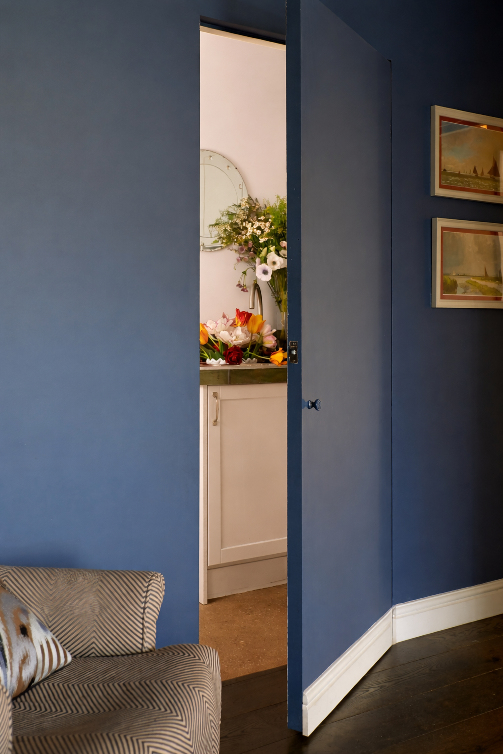 Bright doorway and striped armchair.png