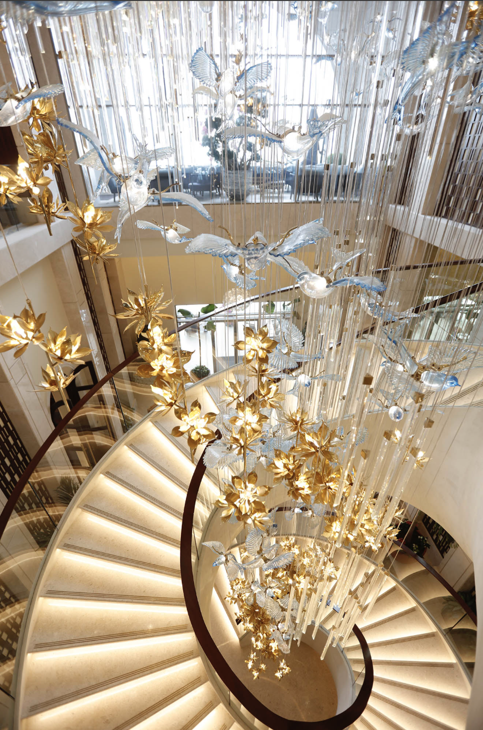 Bespoke light installation chandelier designed by Mohamad Makouk for St. Regis Marsa Arabia Private Island, Doha as part of the curated art program by Core Art Strategies.