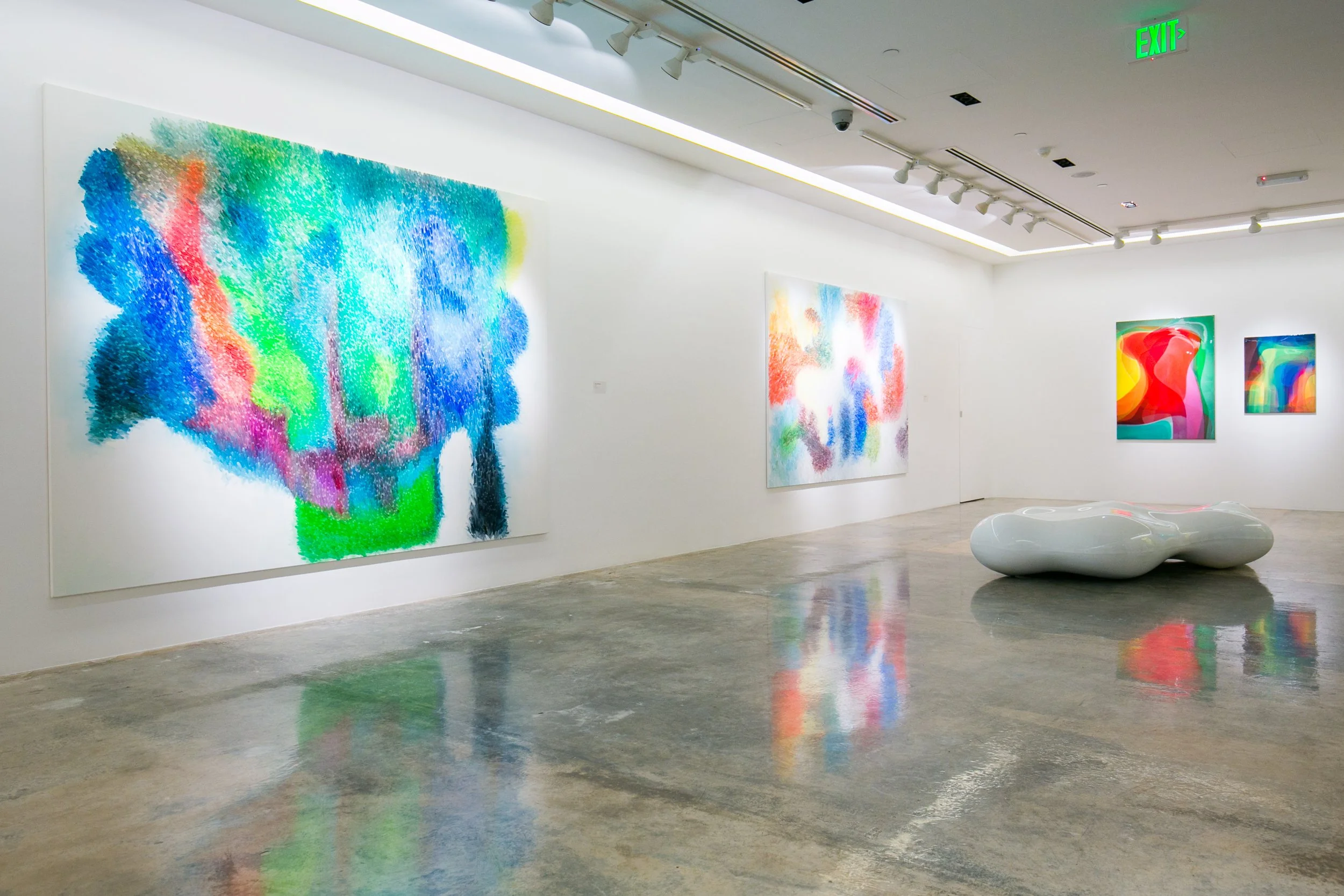 Installation view of a Peter Zimmermann exhibition in Qatar, presenting large-scale abstract paintings within a contemporary gallery environment curated by Mohamad Makouk for Core Art Strategies.