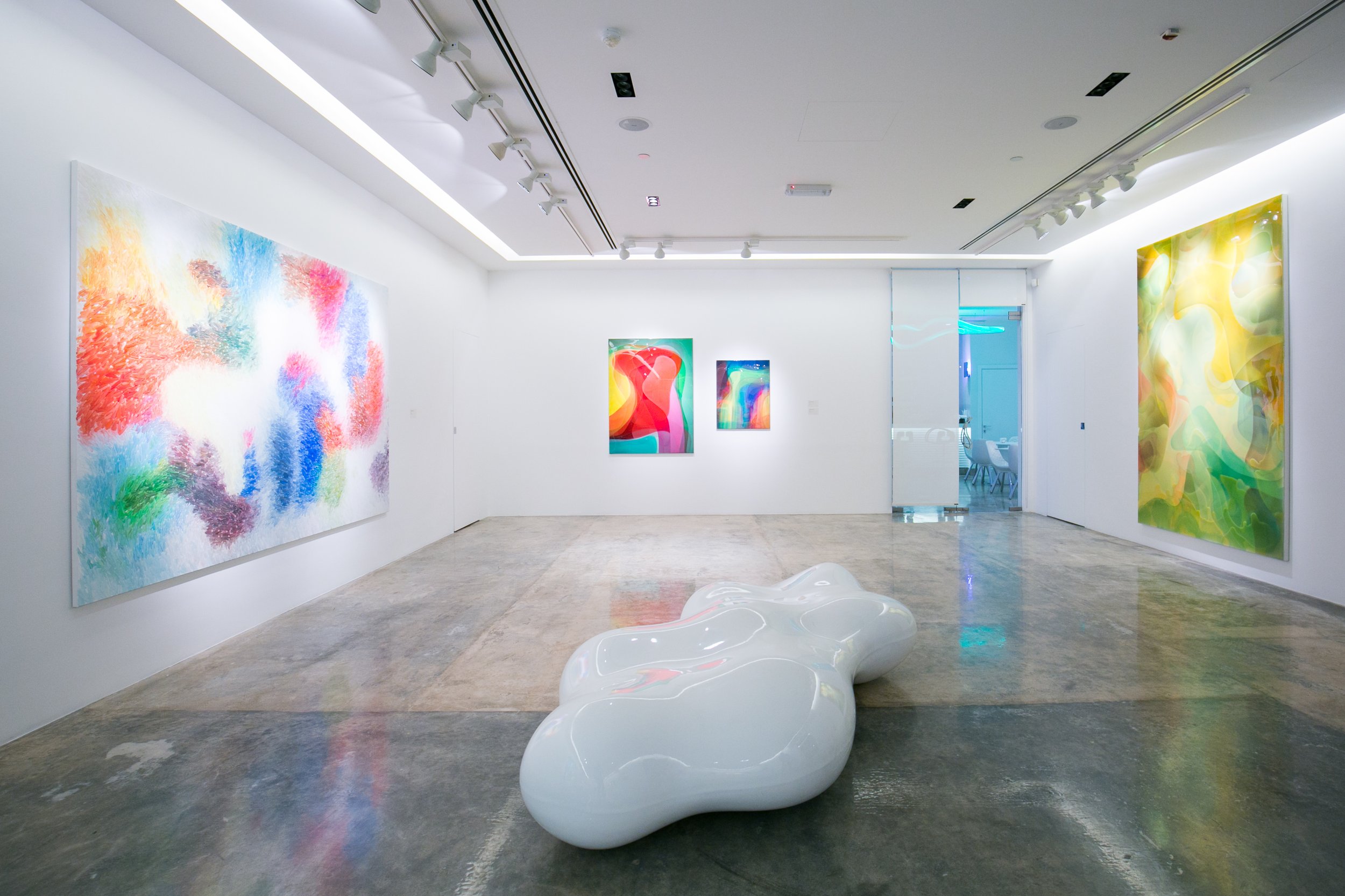 Contemporary art installation view from a Peter Zimmermann exhibition in Qatar, curated by Mohamad Makouk for Core Art Strategies in a clean white gallery setting.