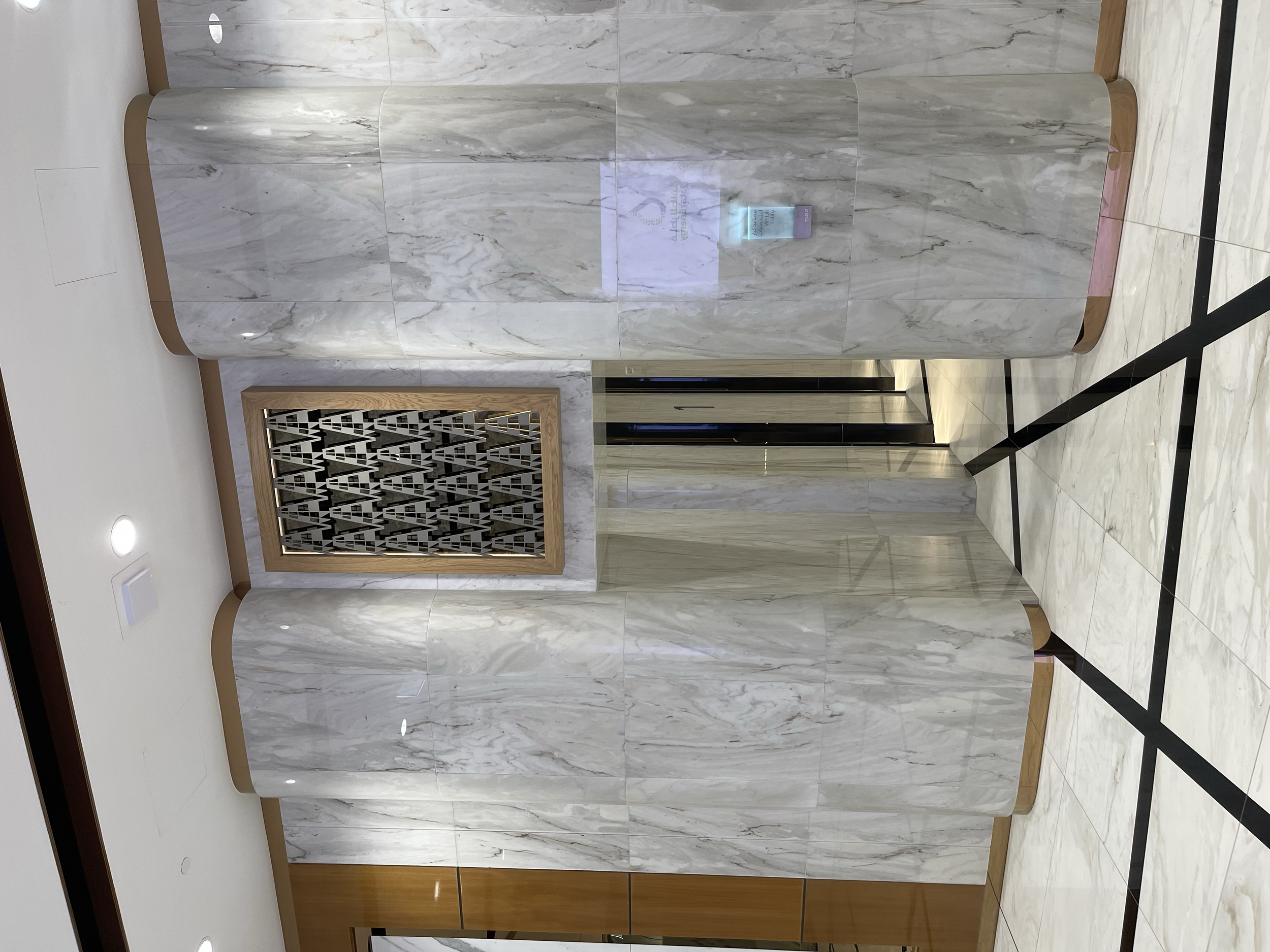 Wall-mounted artwork by Qatari artist Aisha Al-Suwaidi installed as part of the corporate art program curated by Core Art Strategies for QatarEnergy headquarters.