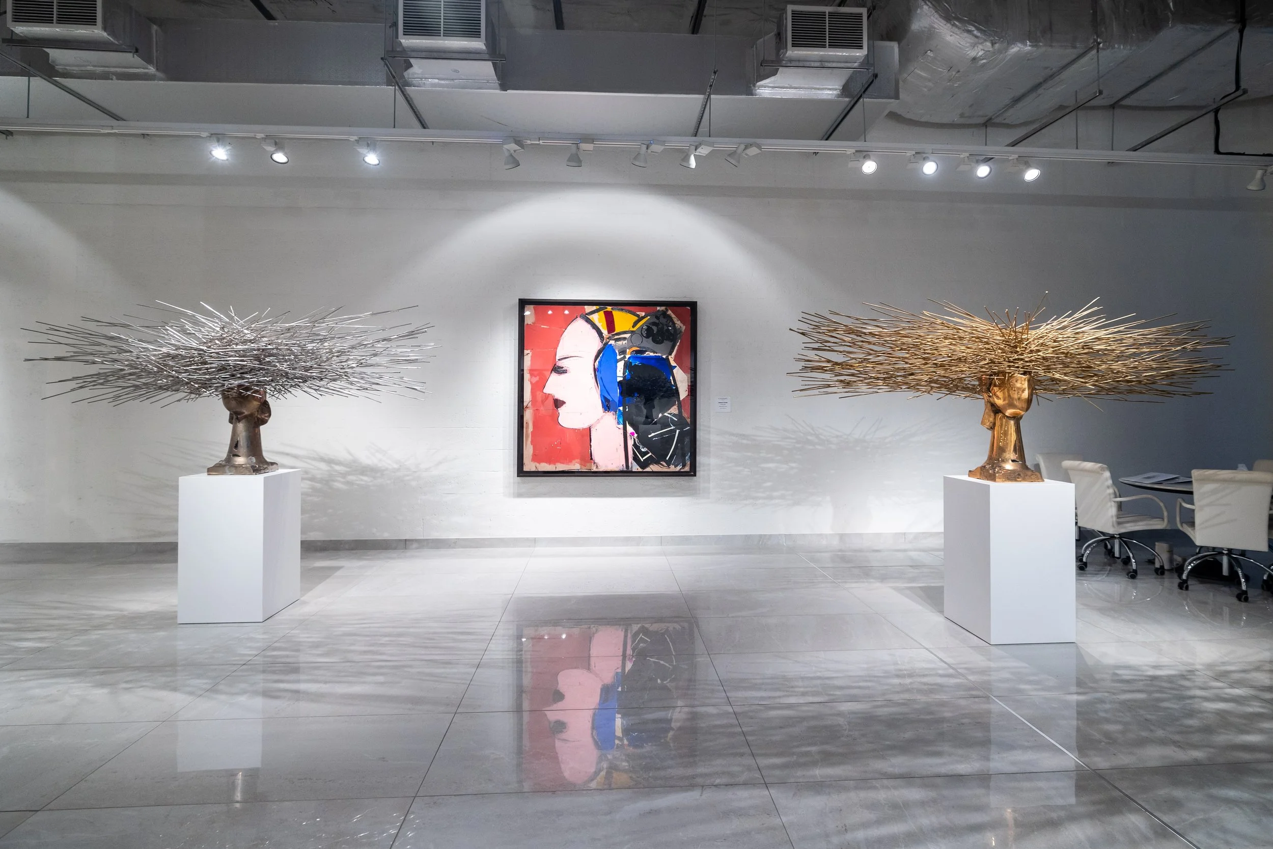 Visitors interacting with Manolo Valdés exhibition curated by Mohamad Ali Makouk at Anima Gallery