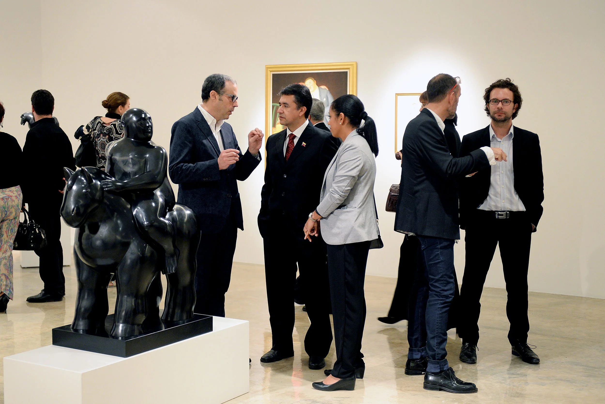 Audience engaging with Fernando Botero artworks in an exhibition curated by Mohamad Ali Makouk at Anima Gallery