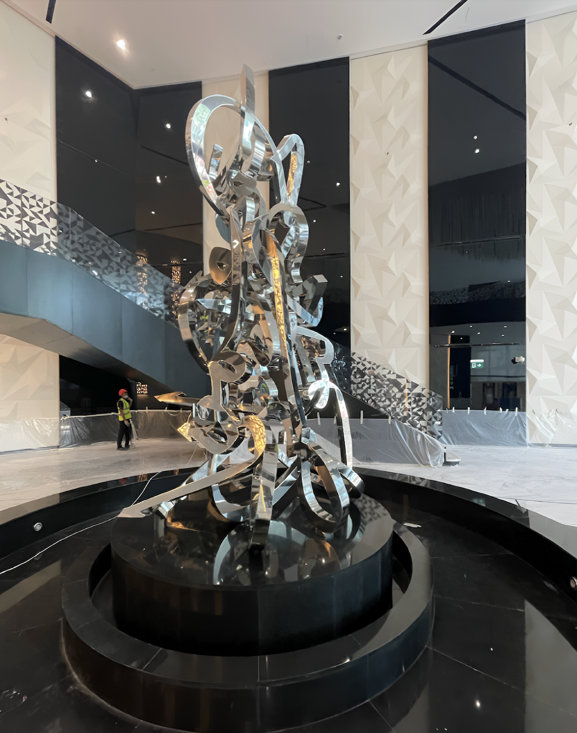 Large contemporary sculpture installed in the VIP waiting area lobby of QatarEnergy Tower 10 headquarters, part of the curated corporate art program by Core Art Strategies.