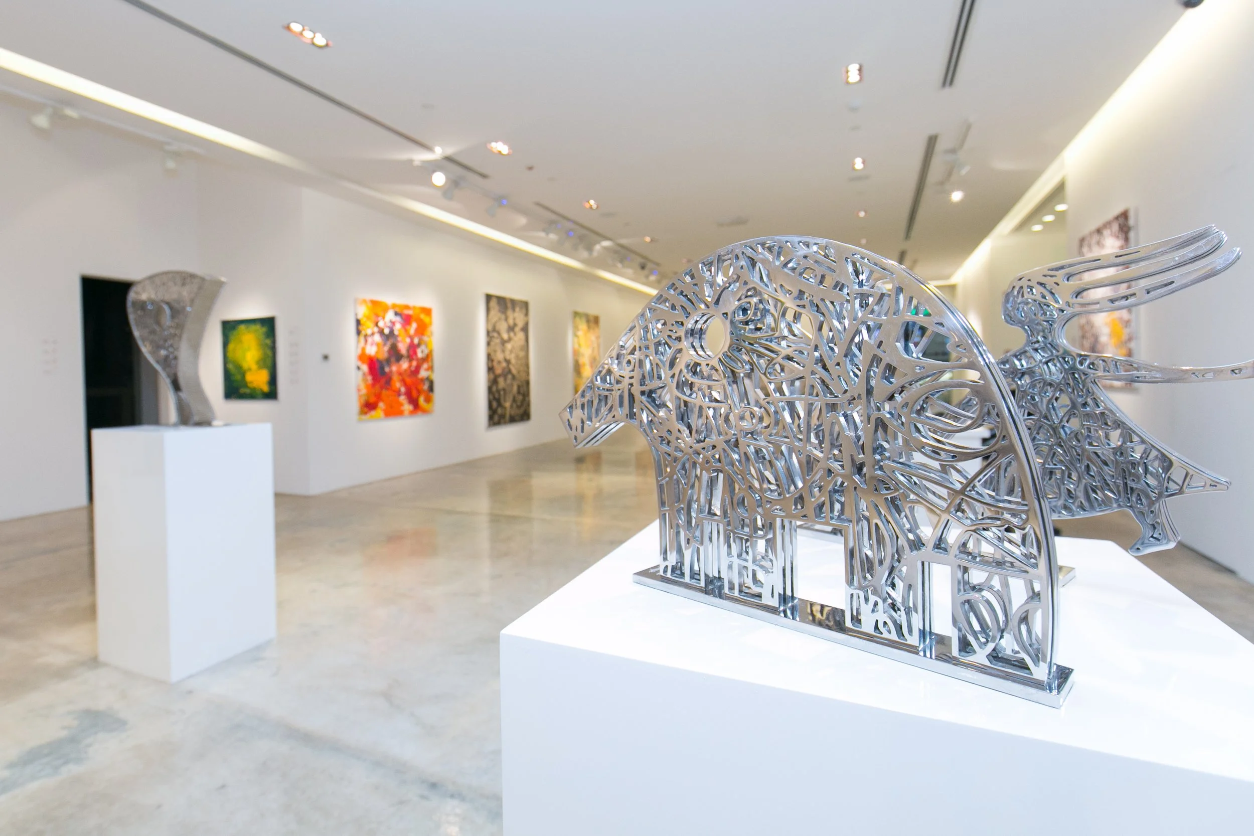 A curated exhibition moment from Nadim Karam’s presentation in Qatar, where contemporary art, collectors, and public interaction come together through Core Art Strategies.