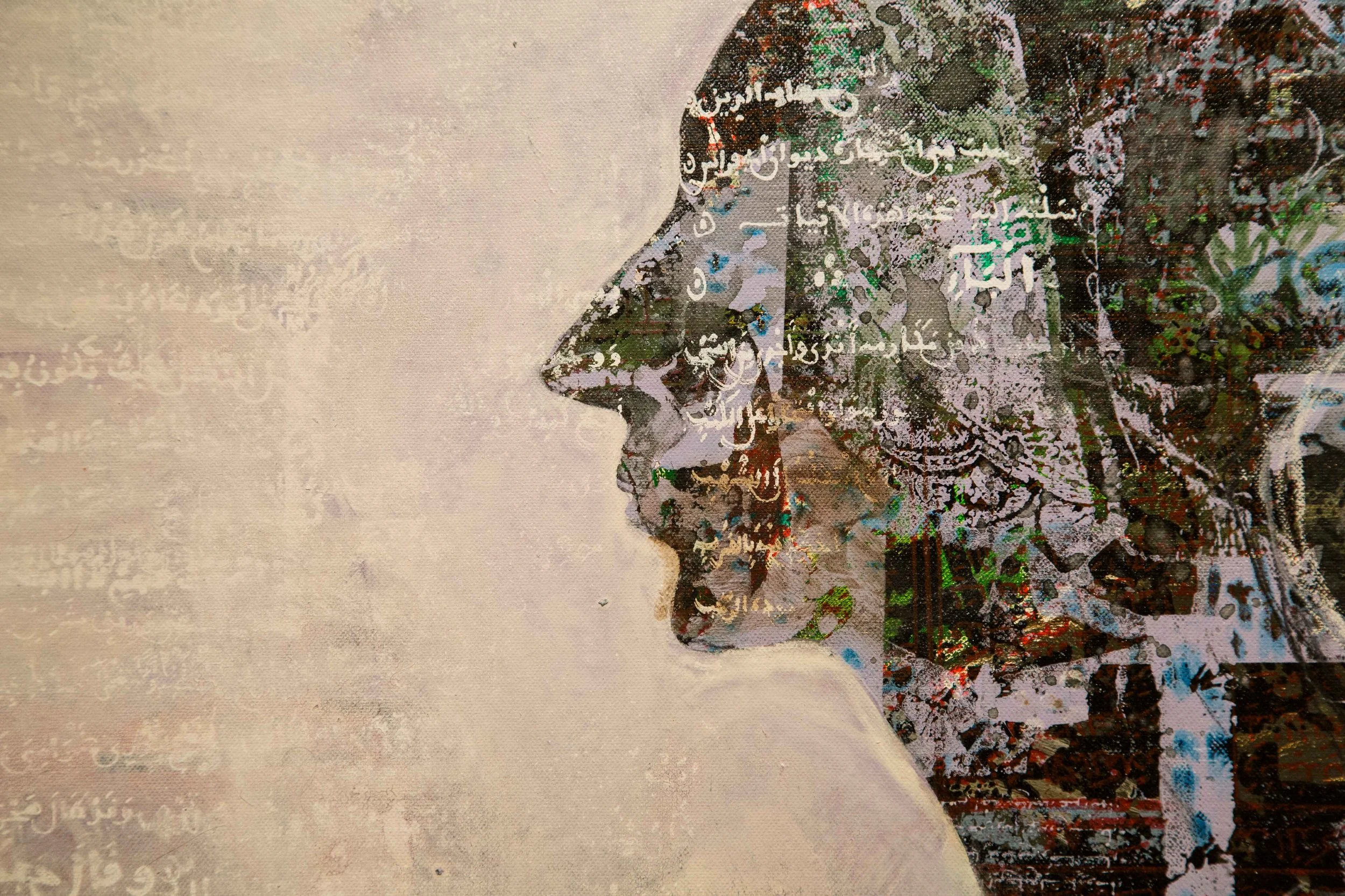 Close-up of a portrait painting by Jihad Al Ameri in Qatar, curated by Mohamad Makouk for Core Art Strategies, featuring layered textures, Arabic script, and mixed-media surface detail.