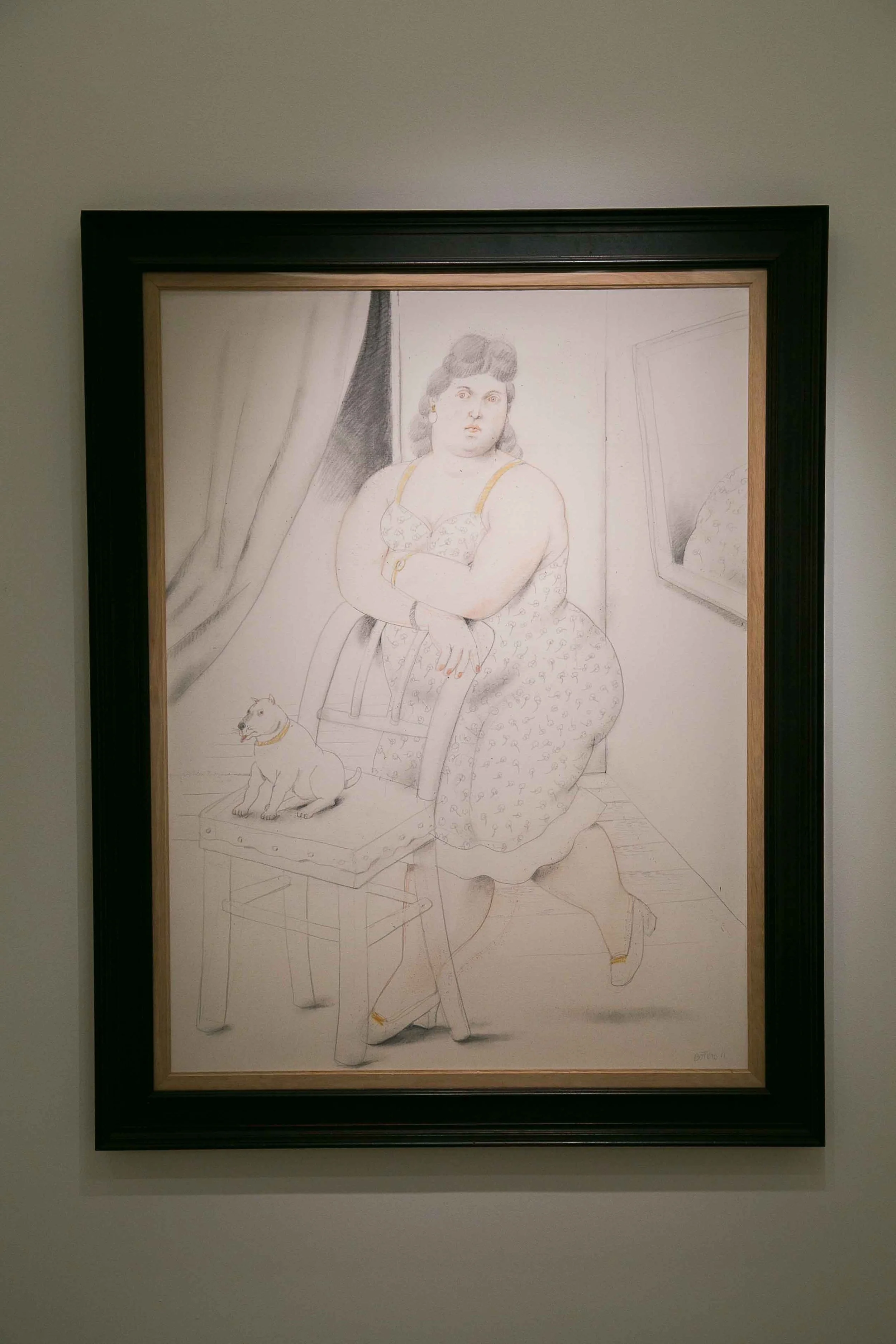 Audience engaging with Fernando Botero artworks in an exhibition curated by Mohamad Ali Makouk in Qatar