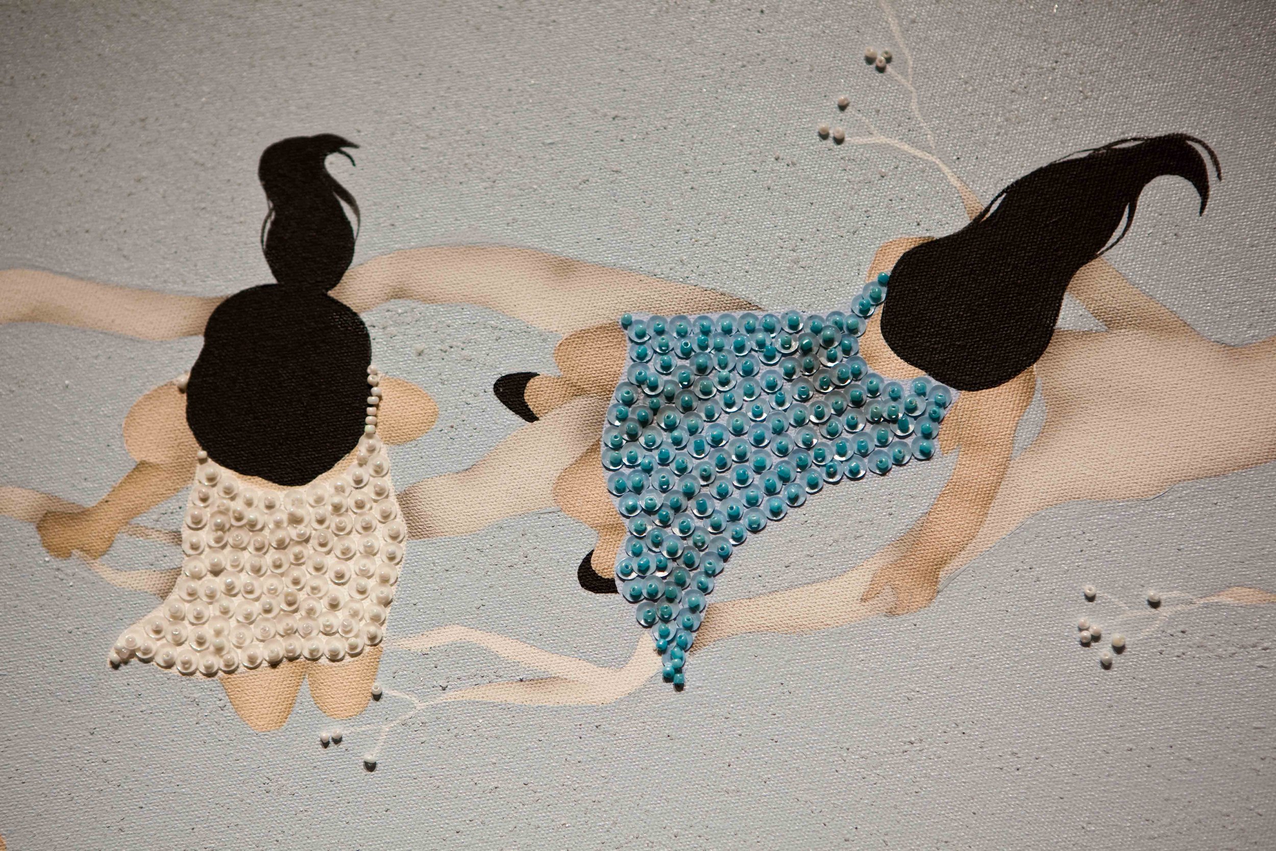 Artwork of two women lying on their sides with black hair, one wearing a pearl dress and the other a turquoise bead dress, set against a textured background.